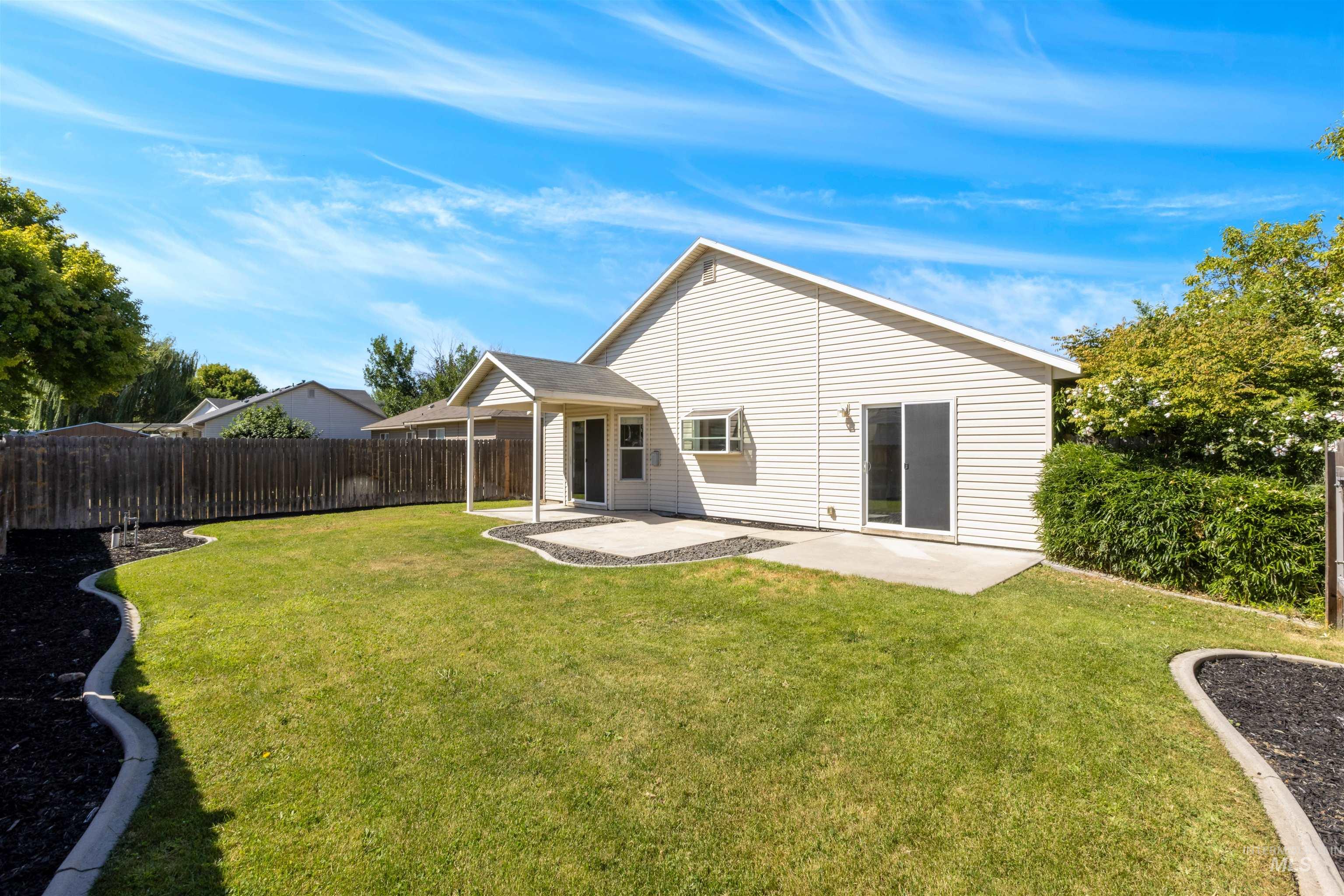 Back of property featuring a patio