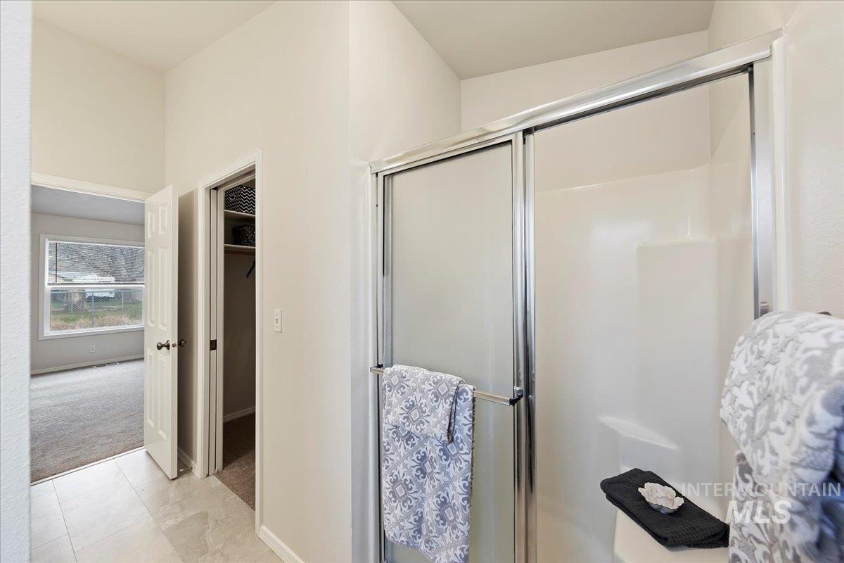Step in Shower w/Sit Down Bench, LVT Floors, Linen Closet, Walk In Closet