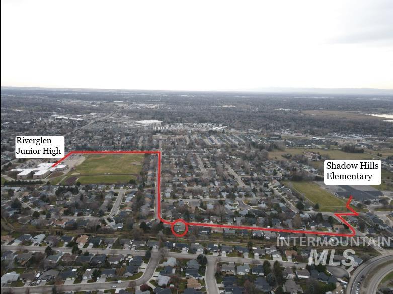 Aerial overview of property's location with property parcel outlined