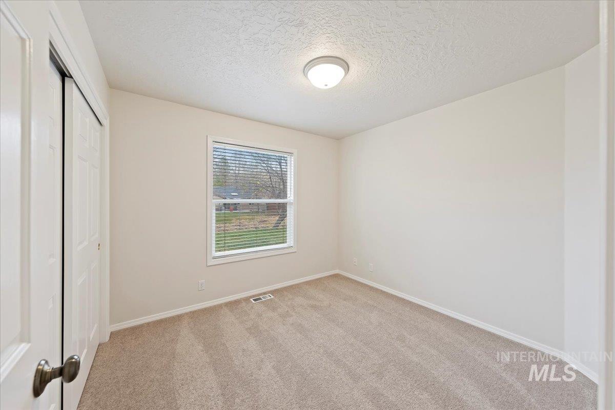 Bedroom #3 is 10x10 w/window to backyard area!