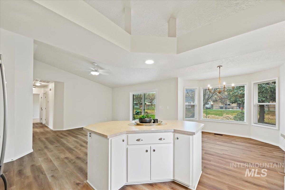 This is a Cook's Kitchen w/Spacious Island has a breakfast bar & additional Storage Cabinets & Drawers!