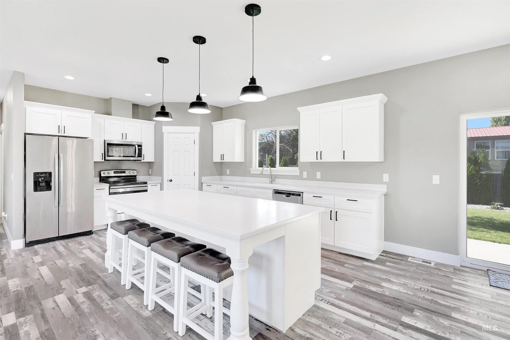 Photo of 680 E 19th St, Burley, ID 83318 (MLS # 98996175)