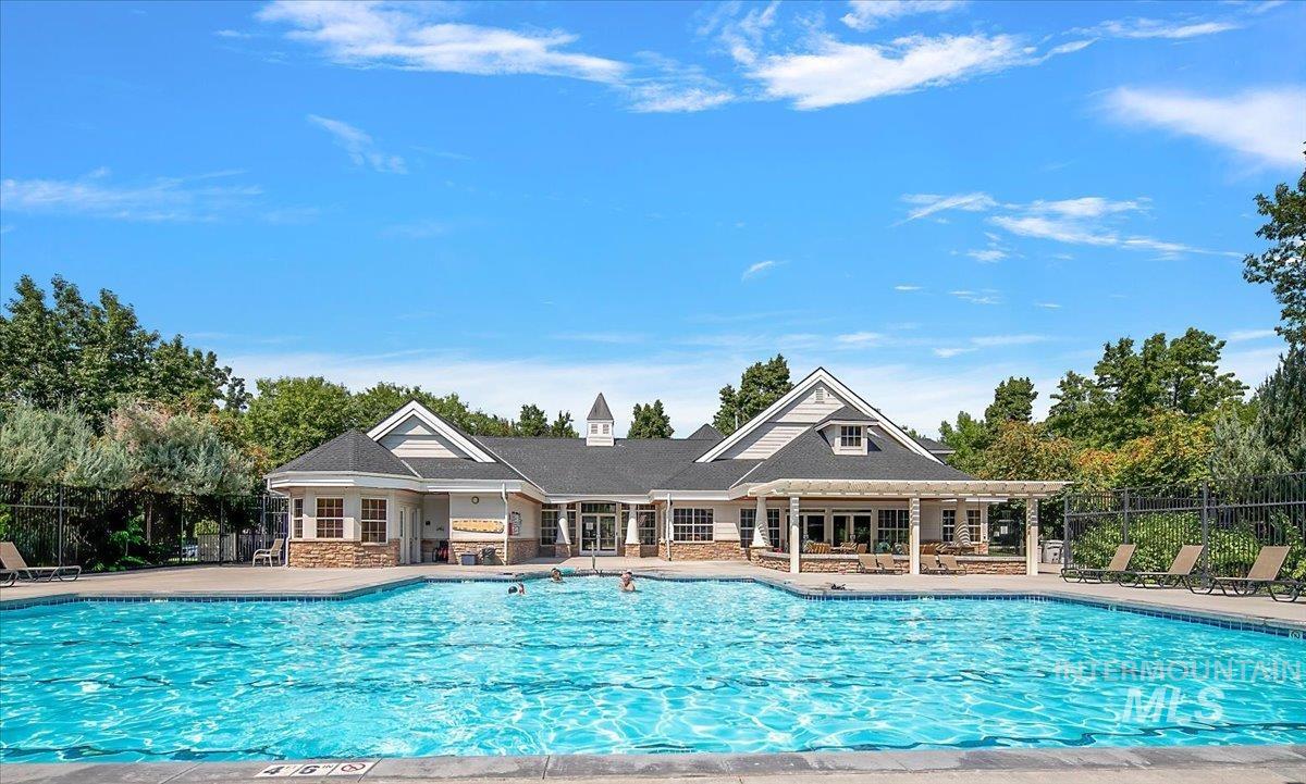Community pool with a patio area