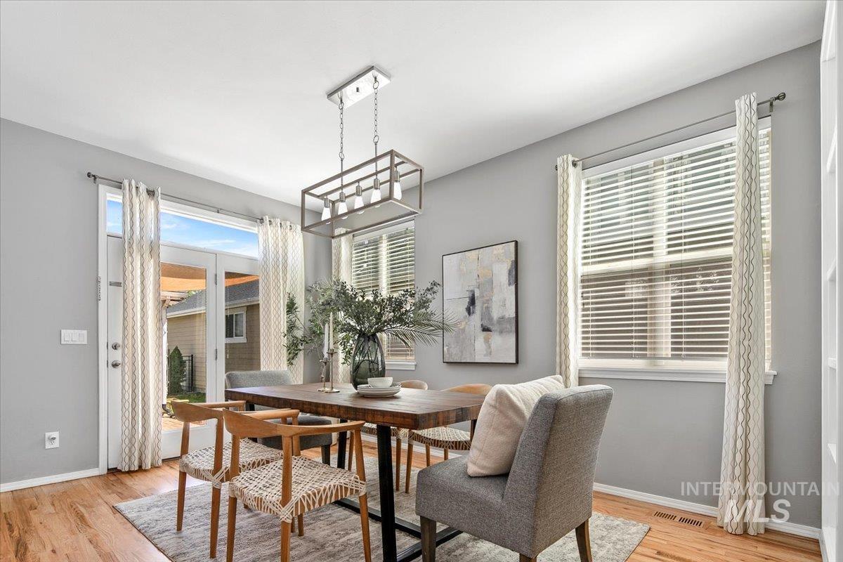 Dining room with light wood finished floors