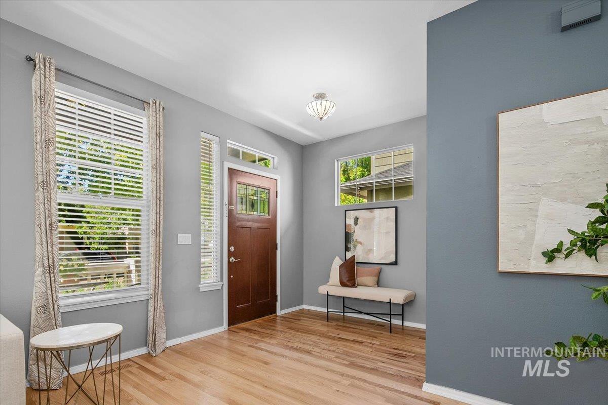 Foyer entrance featuring light hardwood flooring