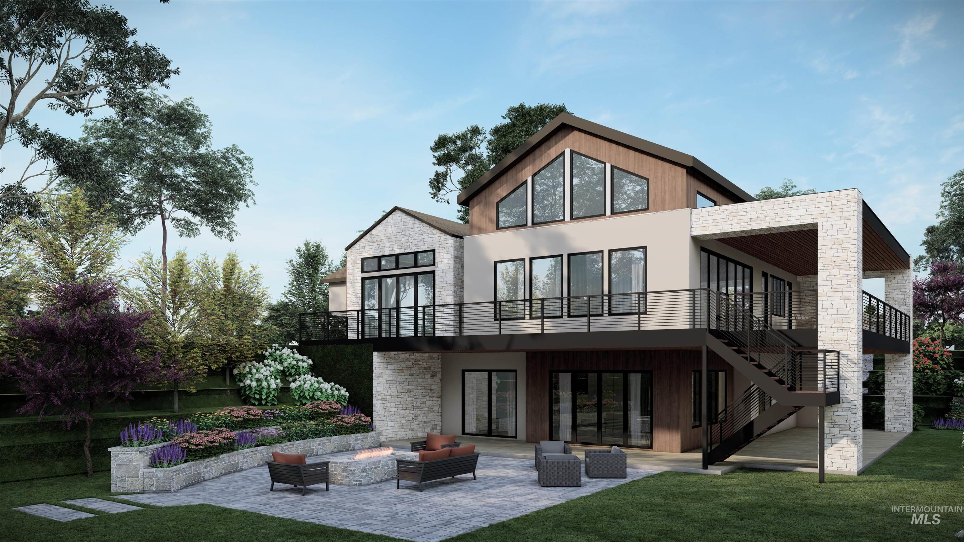 Back of house featuring stone siding, a patio area, stairs, an outdoor living space with a fire pit, and a lawn