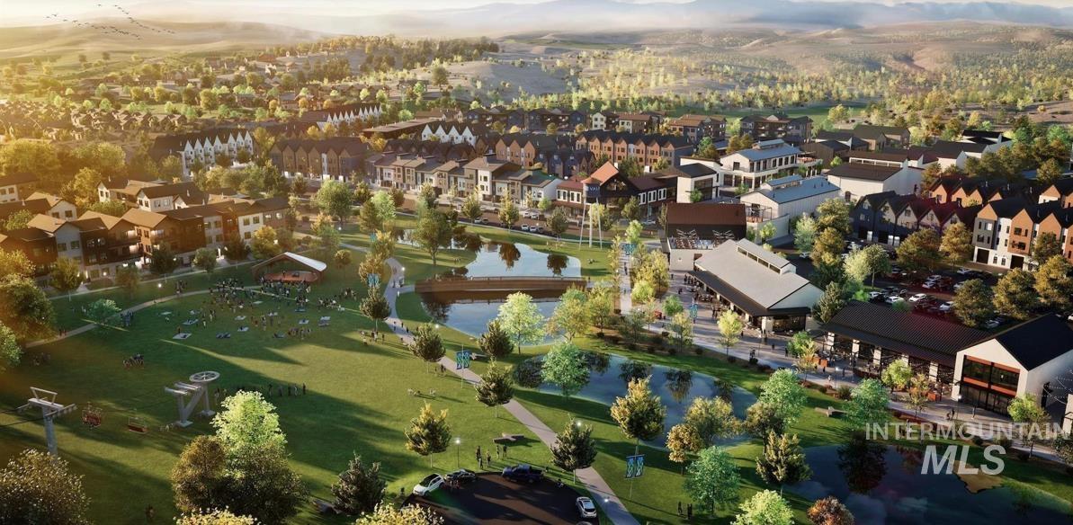 Aerial view of property's location featuring a nearby body of water