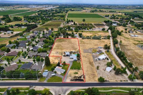 Photo of 1299 N Black Cat Rd, Meridian, ID 83642 (MLS # 98992518)