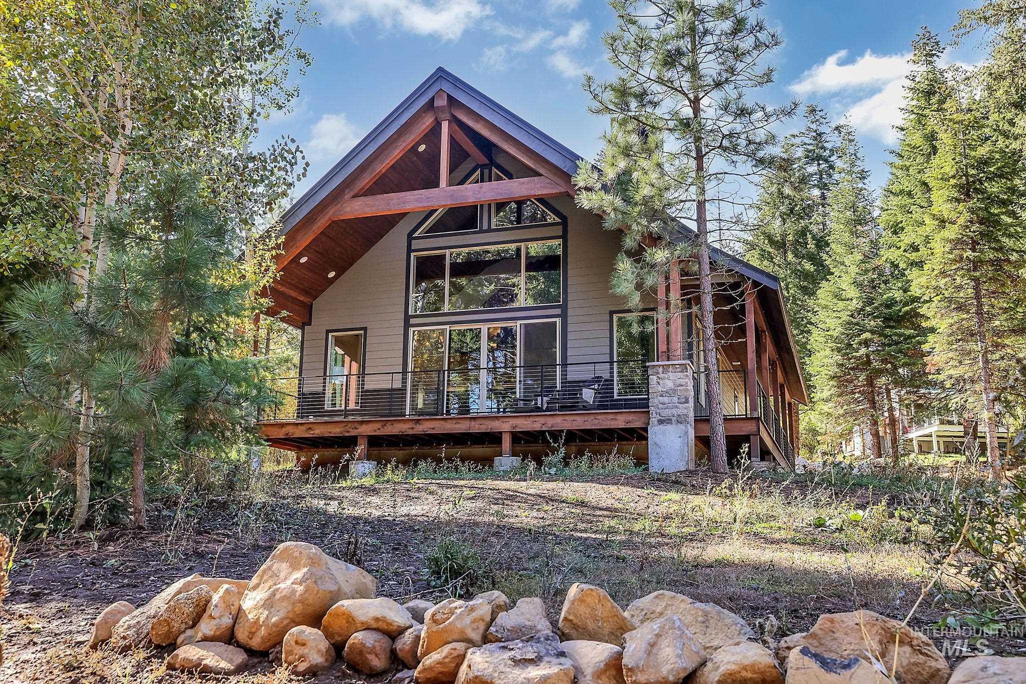 Back of property featuring a deck