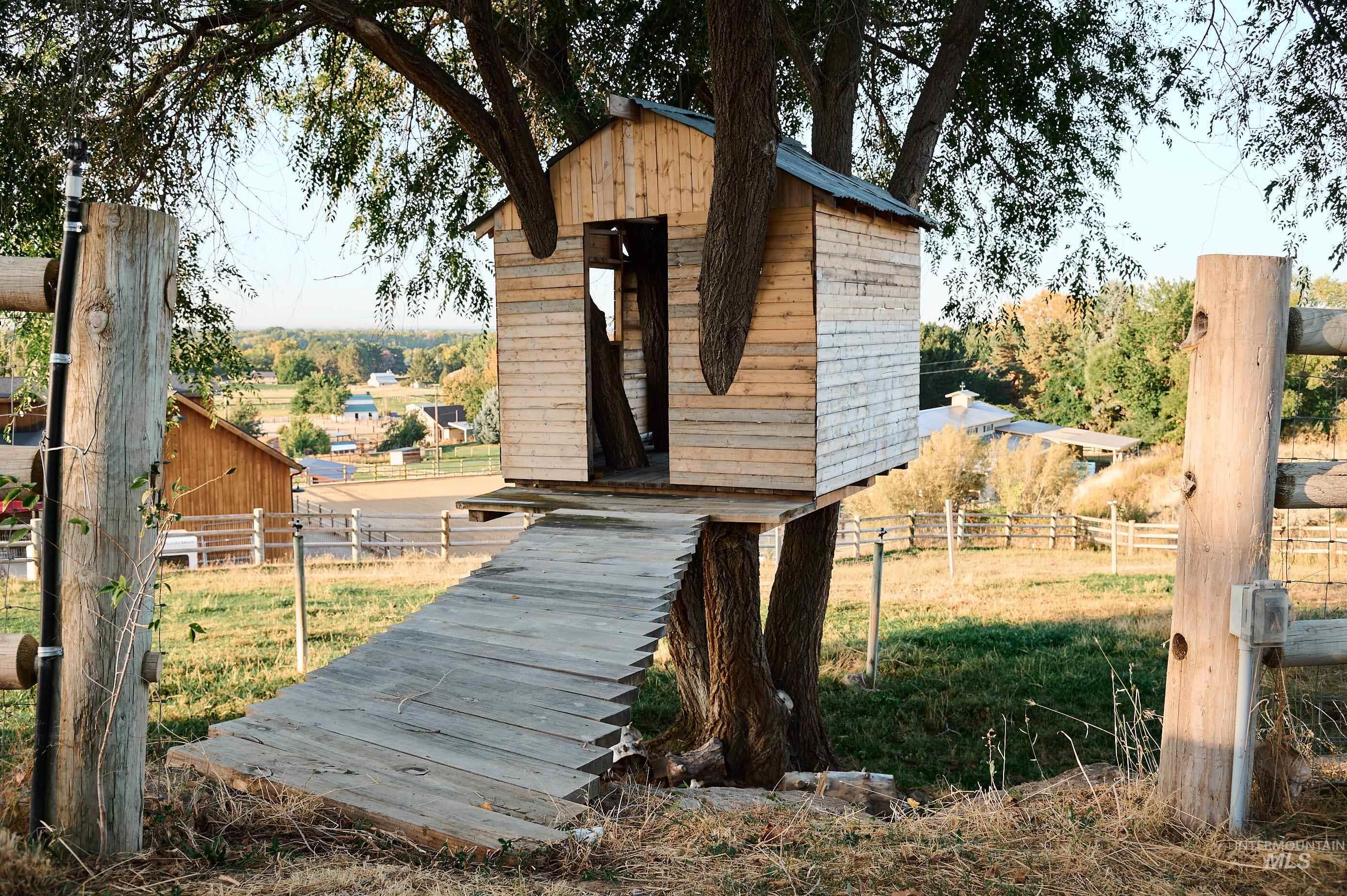 View of outdoor structure featuring a view of rural / pastoral area