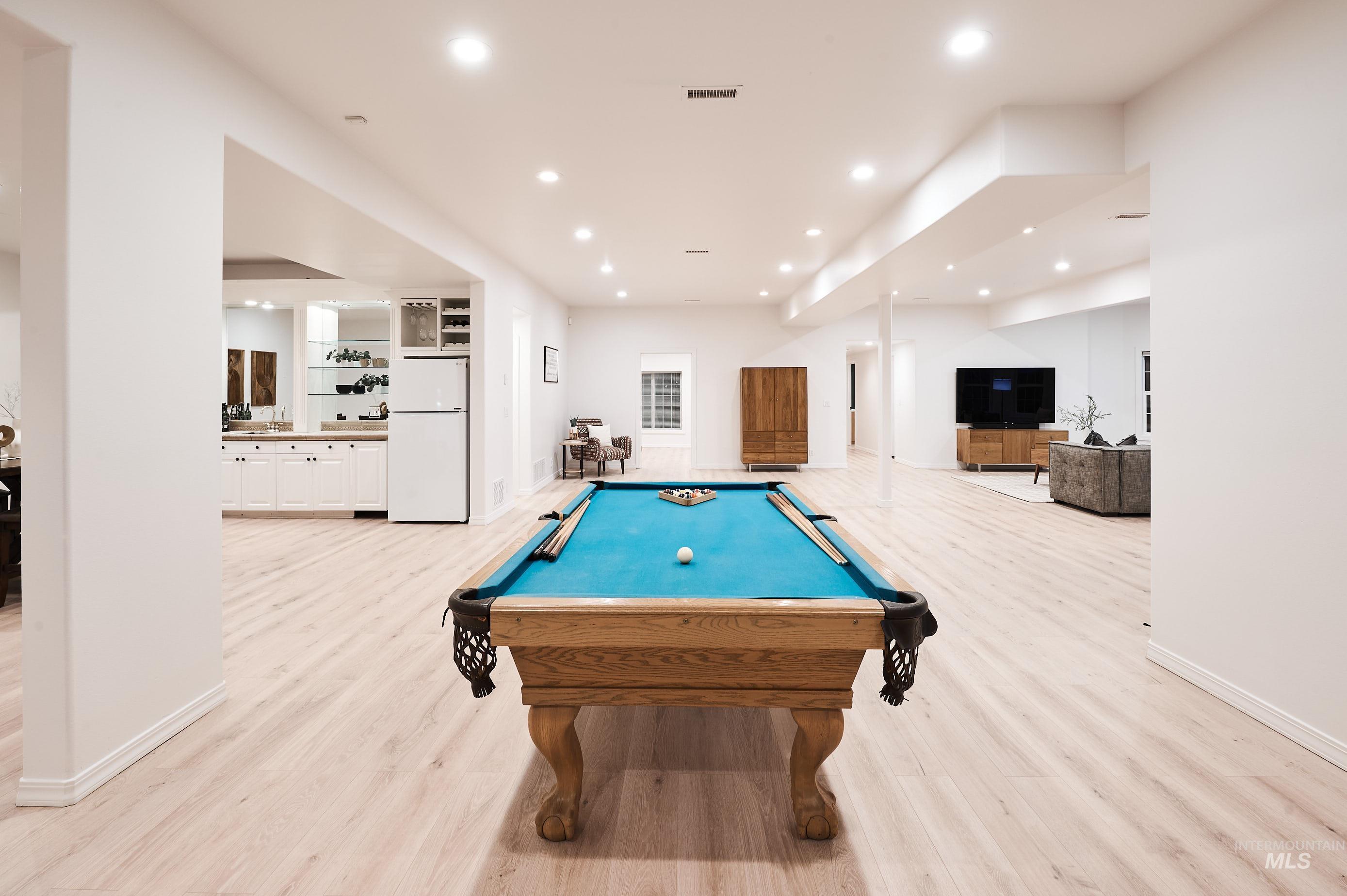 Recreation room featuring billiards table, recessed lighting, and light wood-style floors