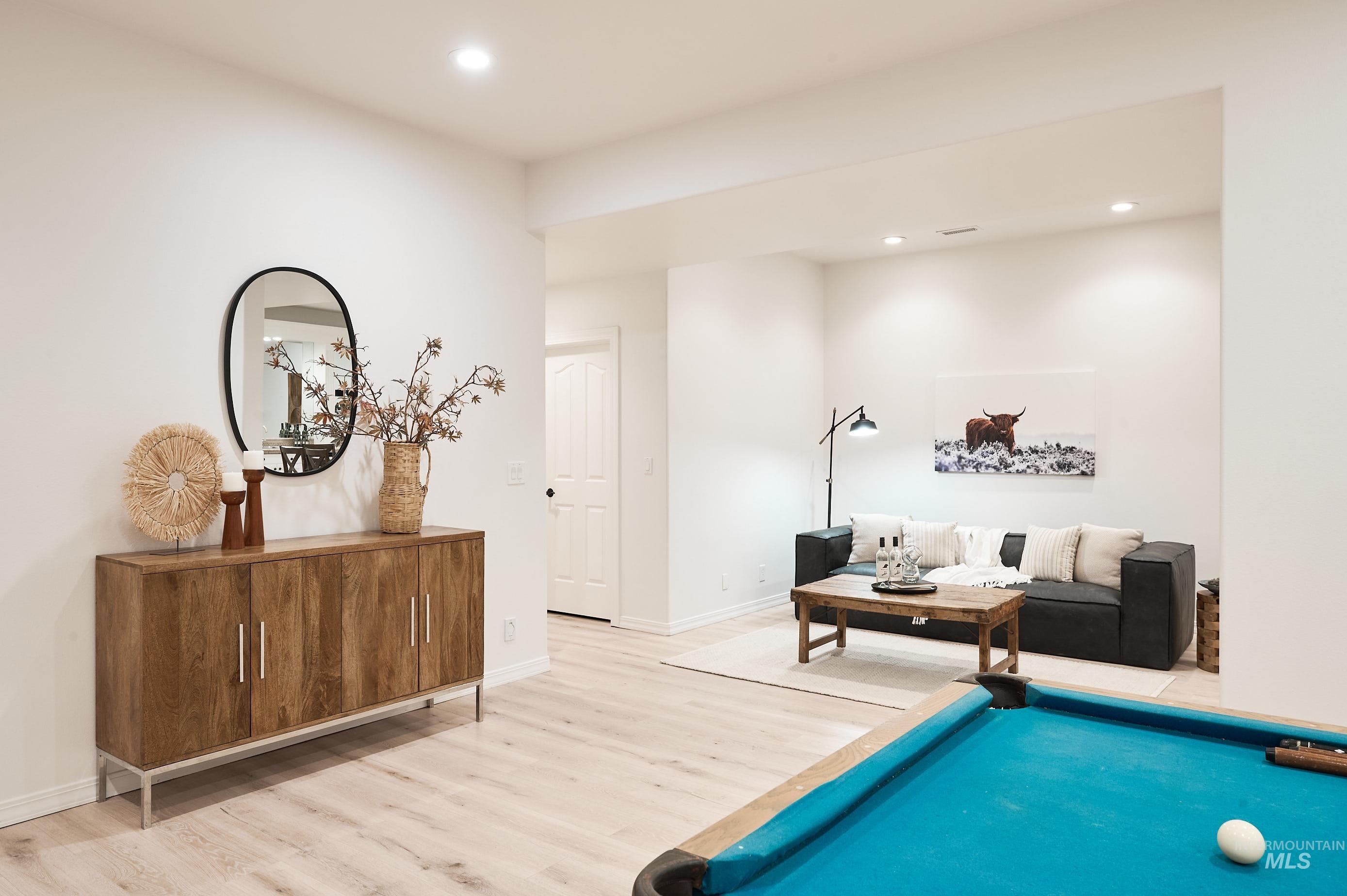 Playroom with wood finished floors, recessed lighting, and billiards