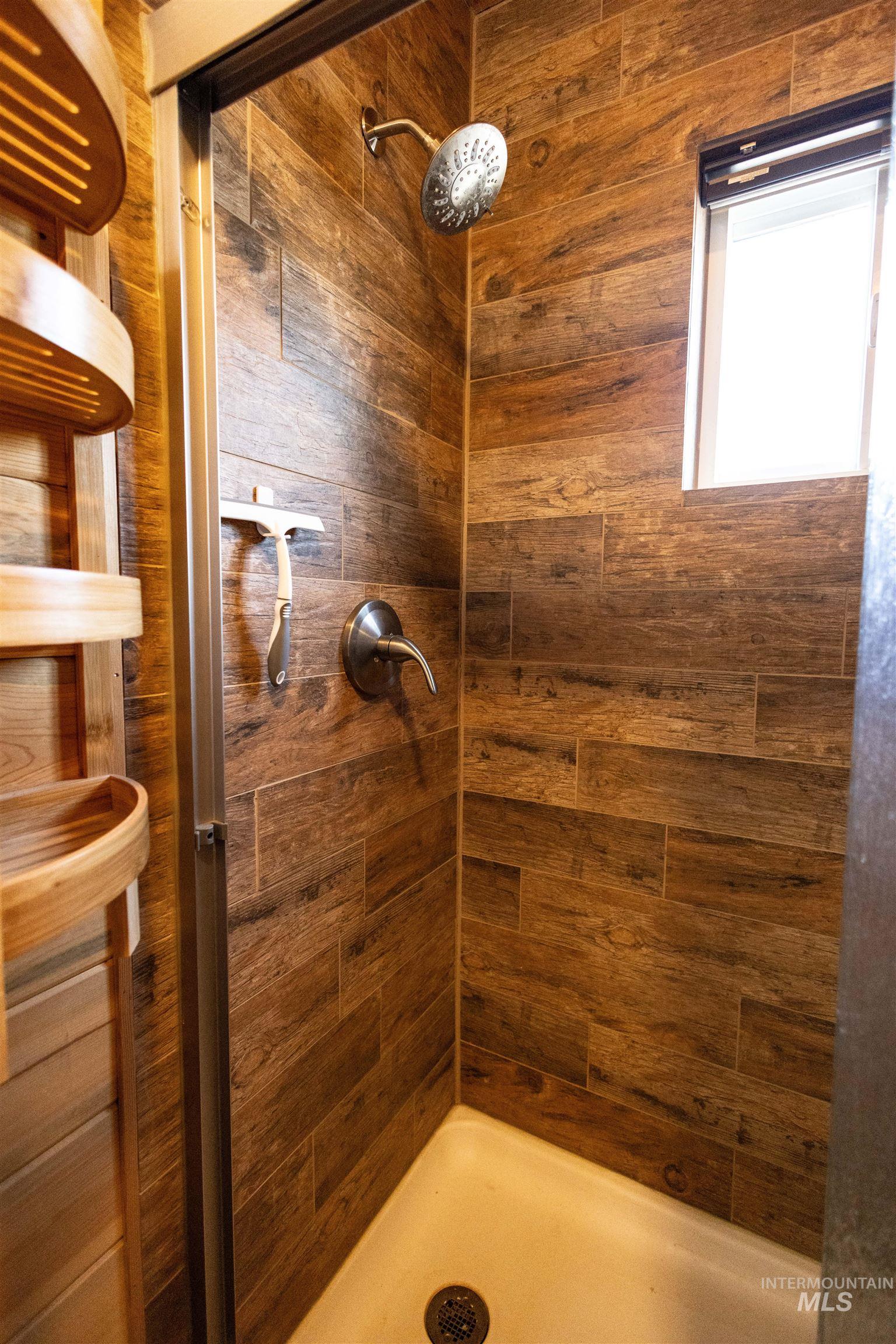 Bathroom featuring a stall shower