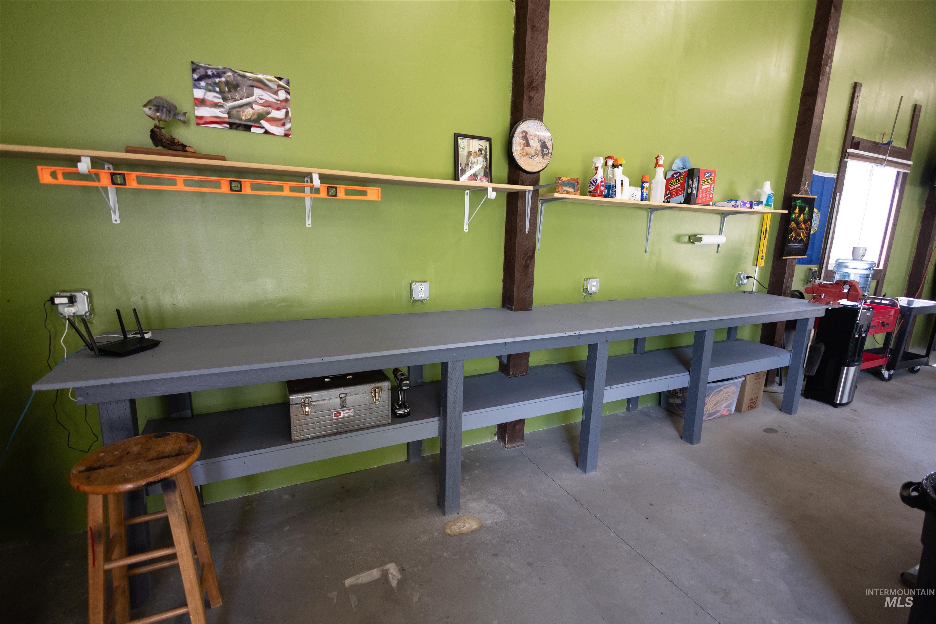 Garage featuring a workshop area