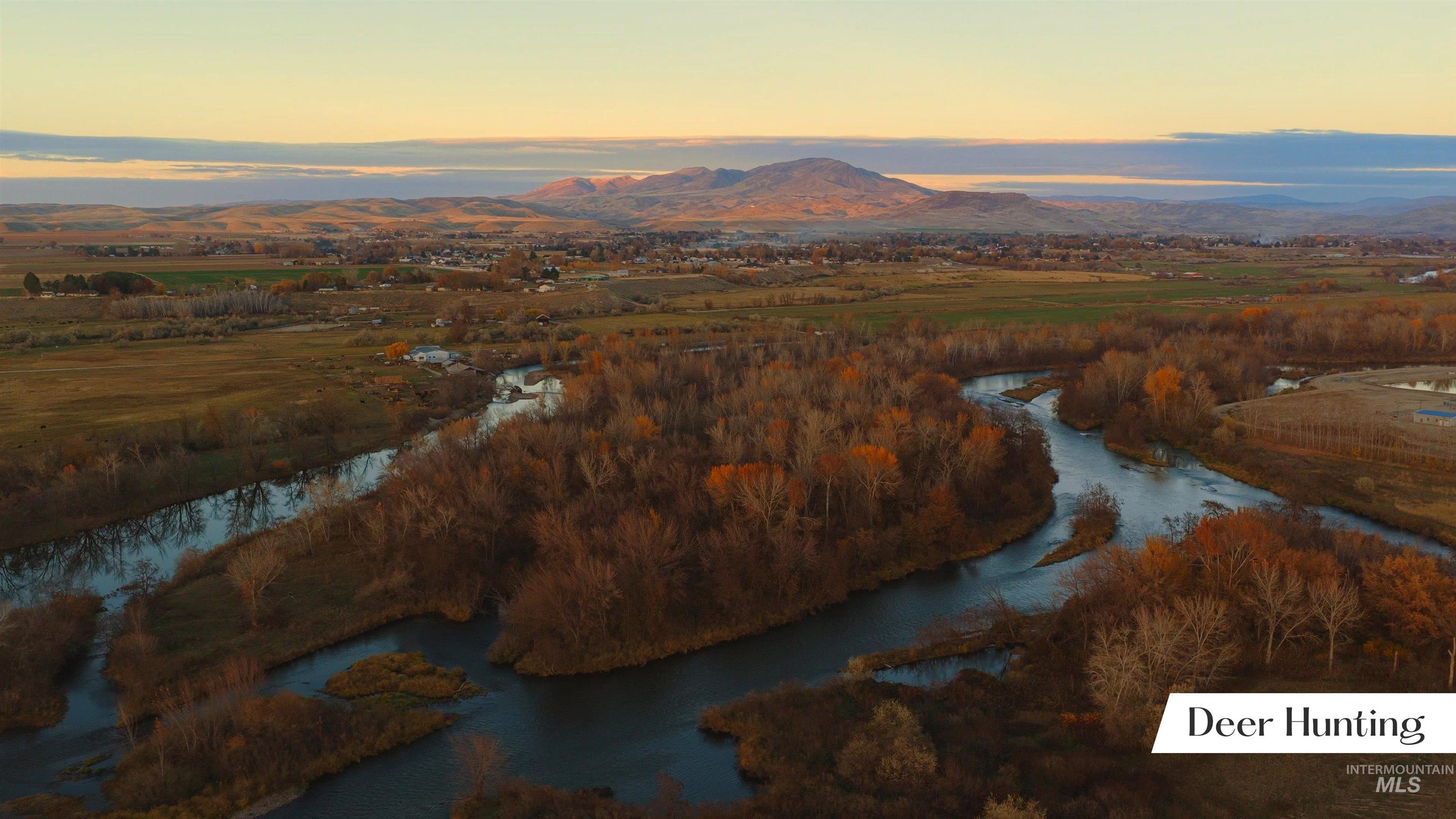 Aerial view at dusk of a water and mountain view