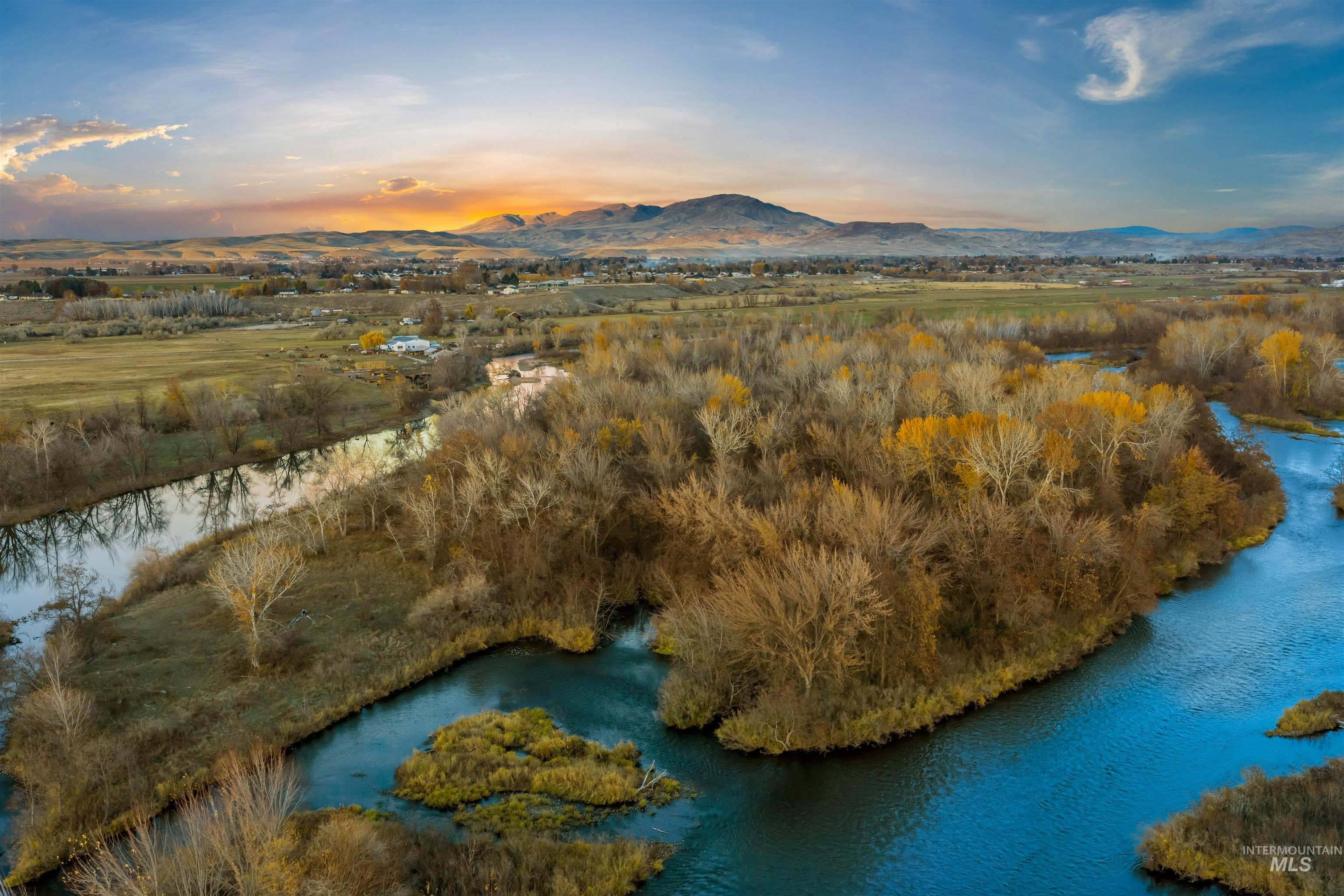 Aerial view at dusk of a water and mountain view