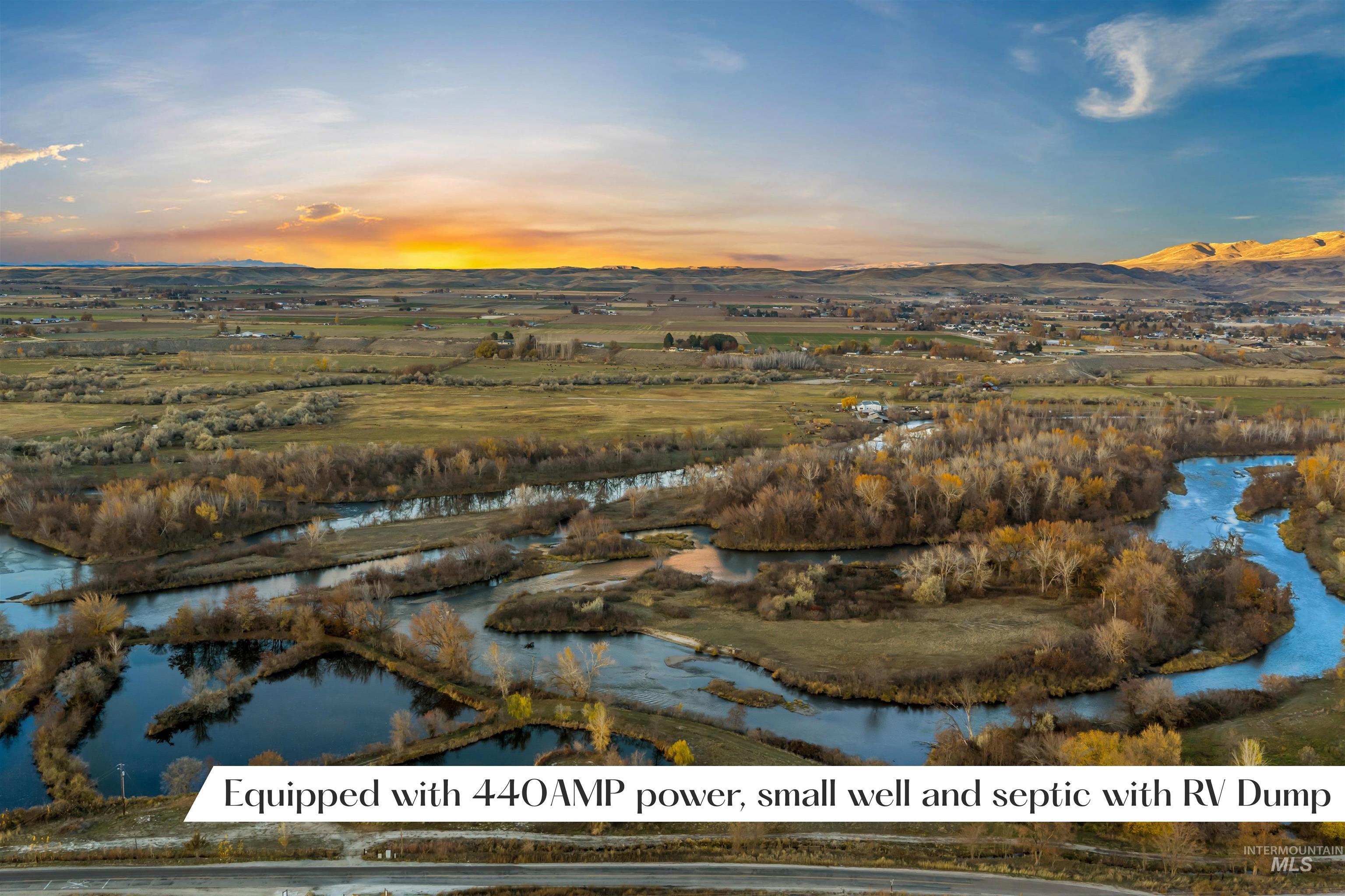 Aerial overview of property's location with a water and mountain view