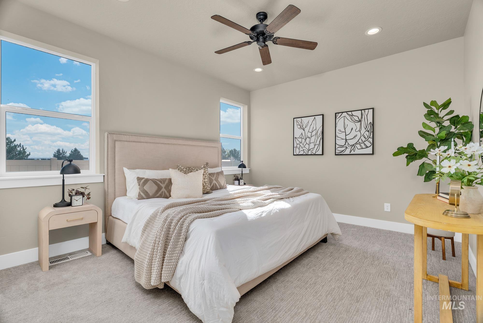 Bedroom with carpet flooring, recessed lighting, and a ceiling fan