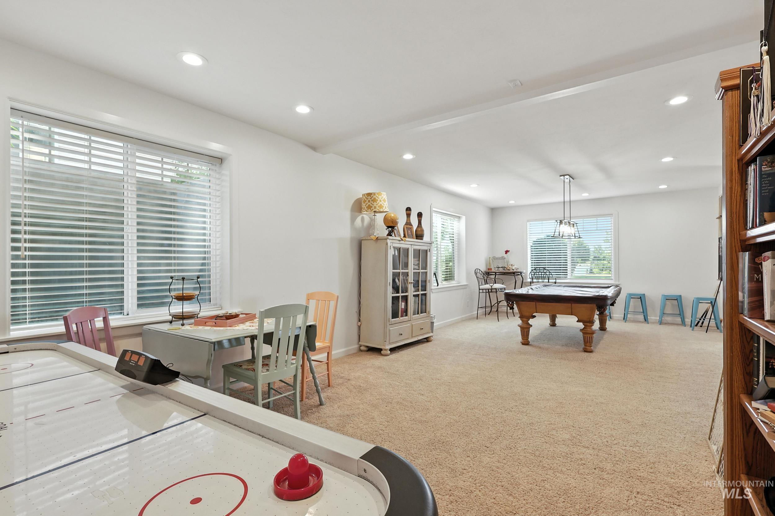 Rec room featuring light carpet, recessed lighting, and billiards table