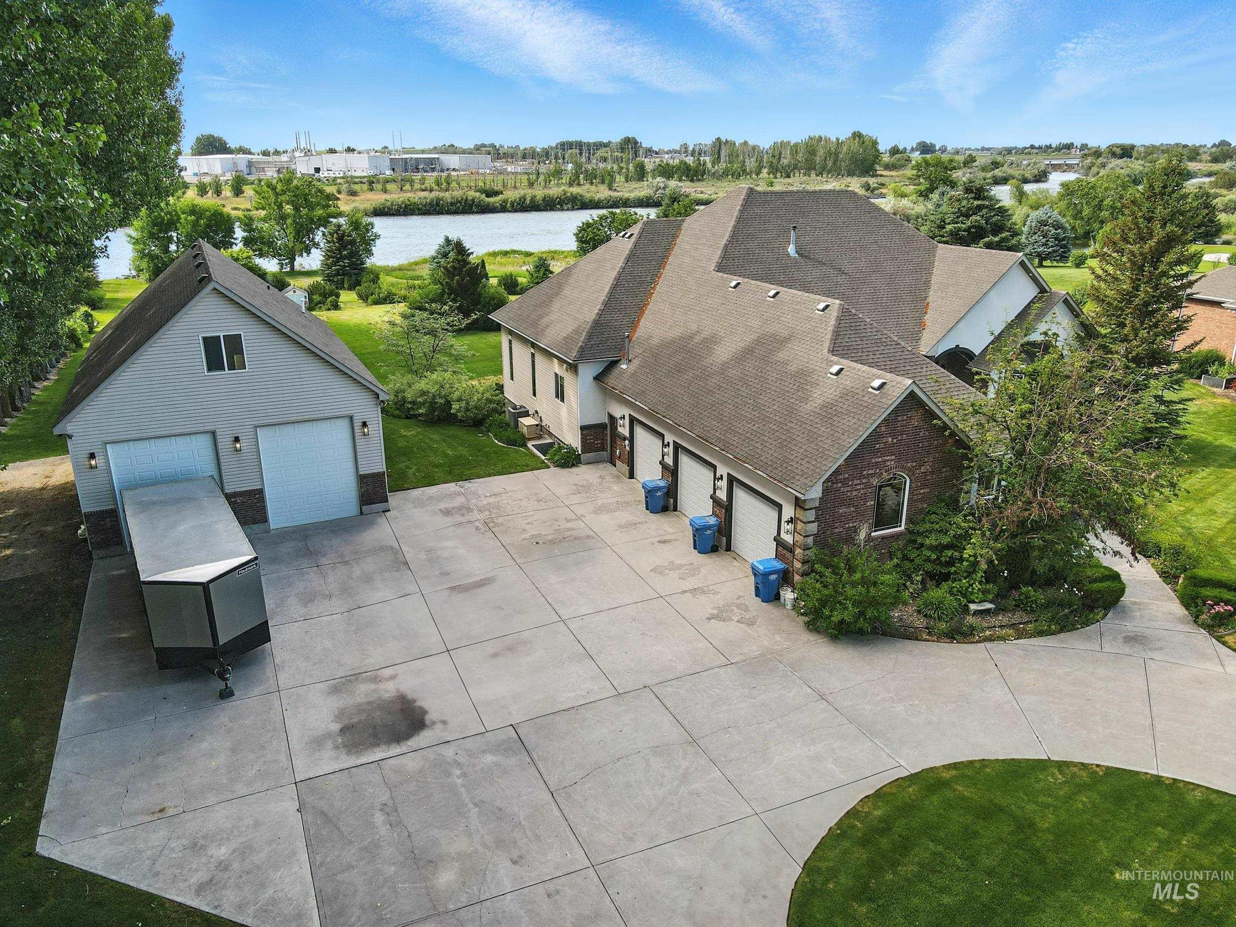 View from above of property with a large body of water
