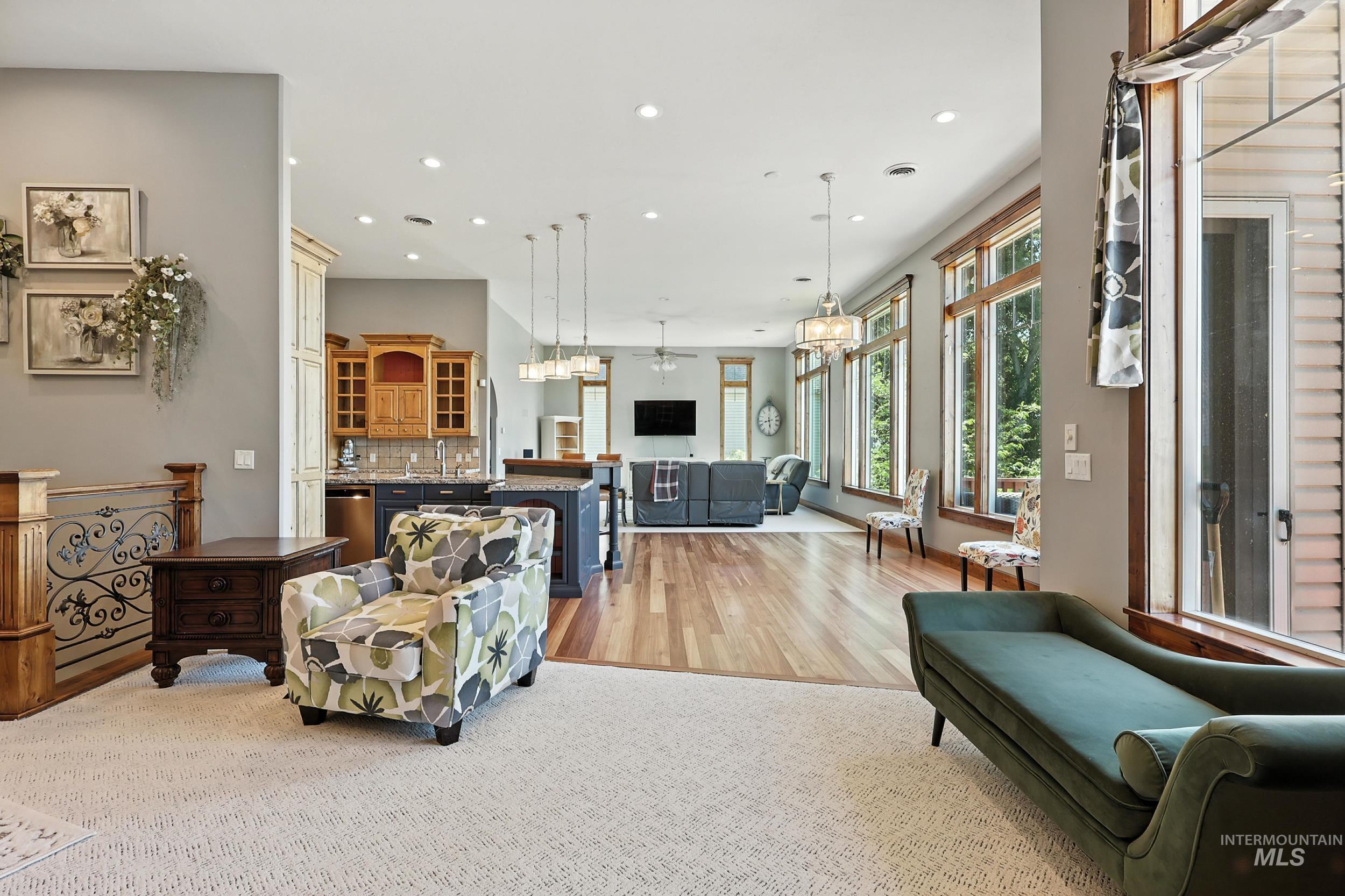 Living area featuring recessed lighting and light wood finished floors