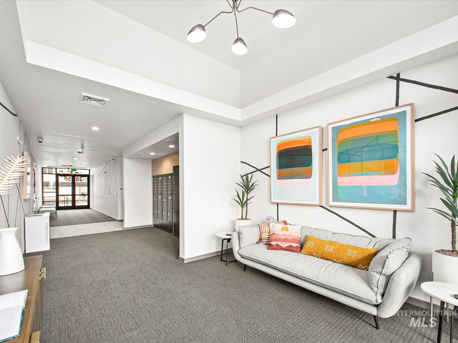 Sitting room featuring mail area and recessed lighting