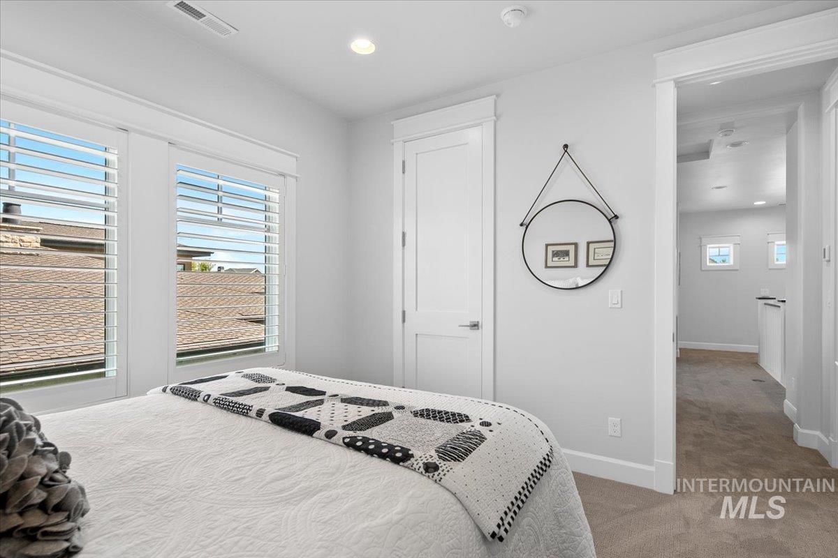 Bedroom with carpet and recessed lighting