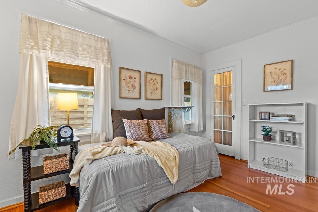 Bedroom with wood finished floors