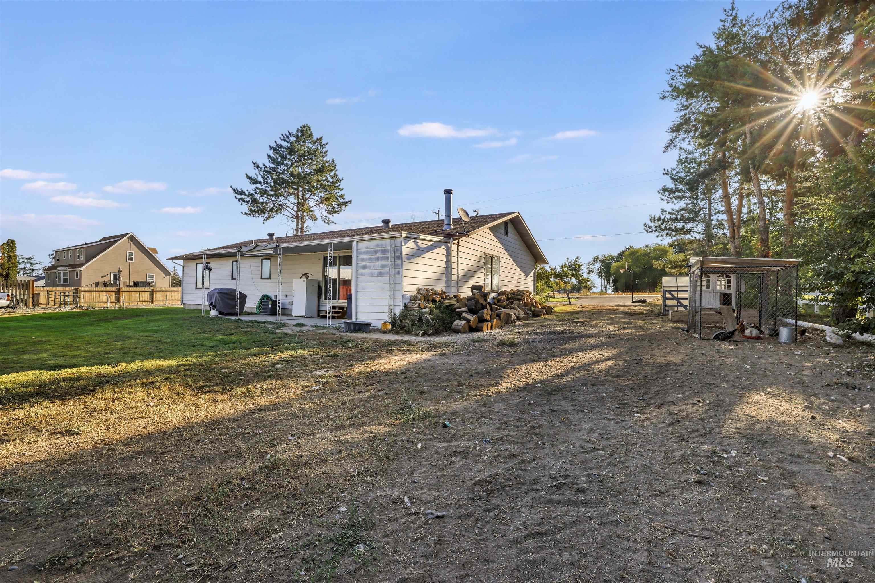 Rear view of property with a patio