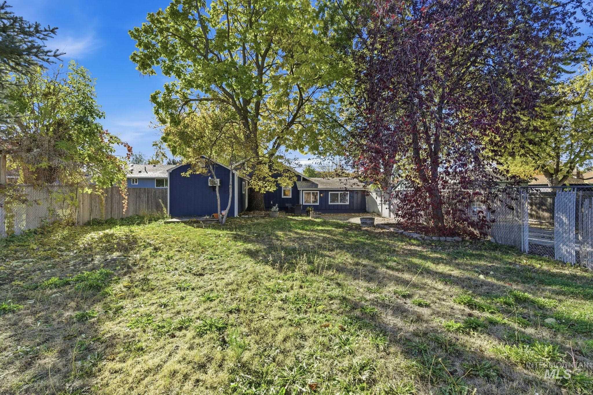 View of fenced backyard