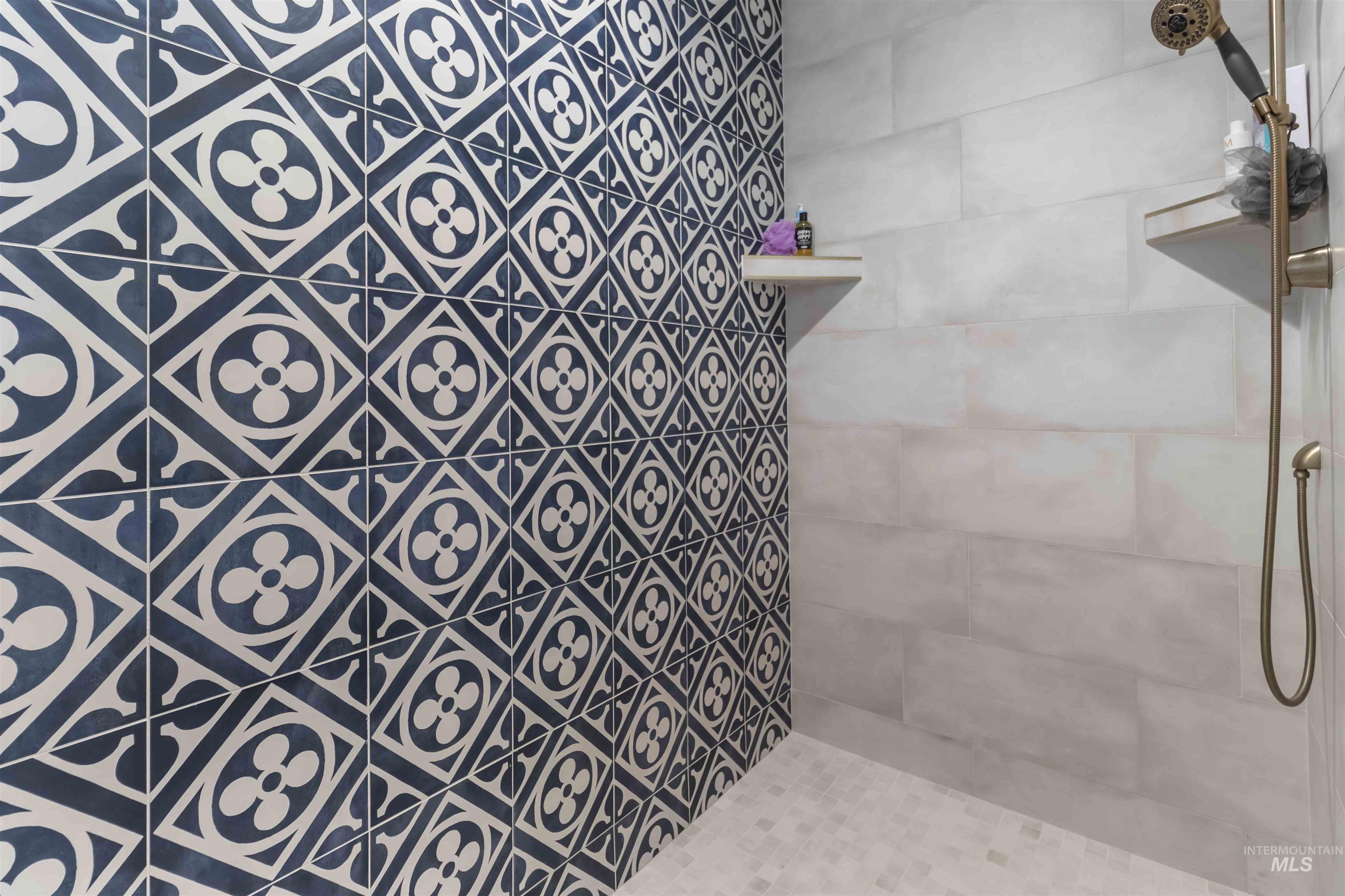 Full bathroom with tiled shower