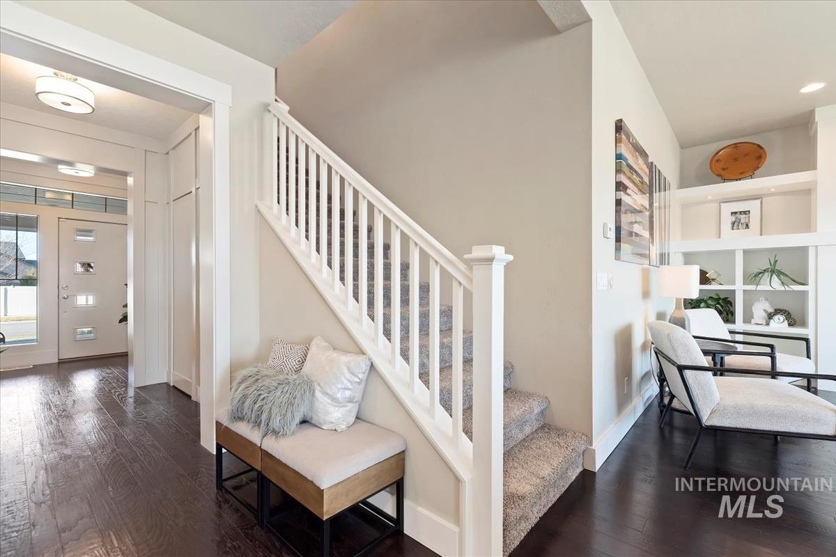 Staircase with wood-type flooring