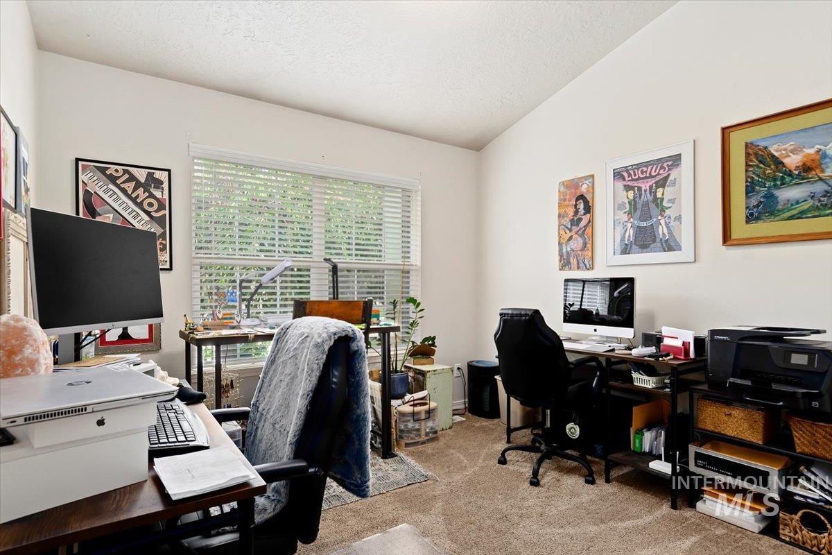 Office featuring light colored carpet
