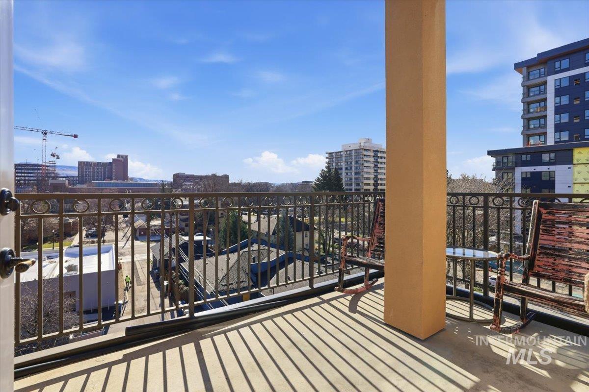 Balcony featuring a city view