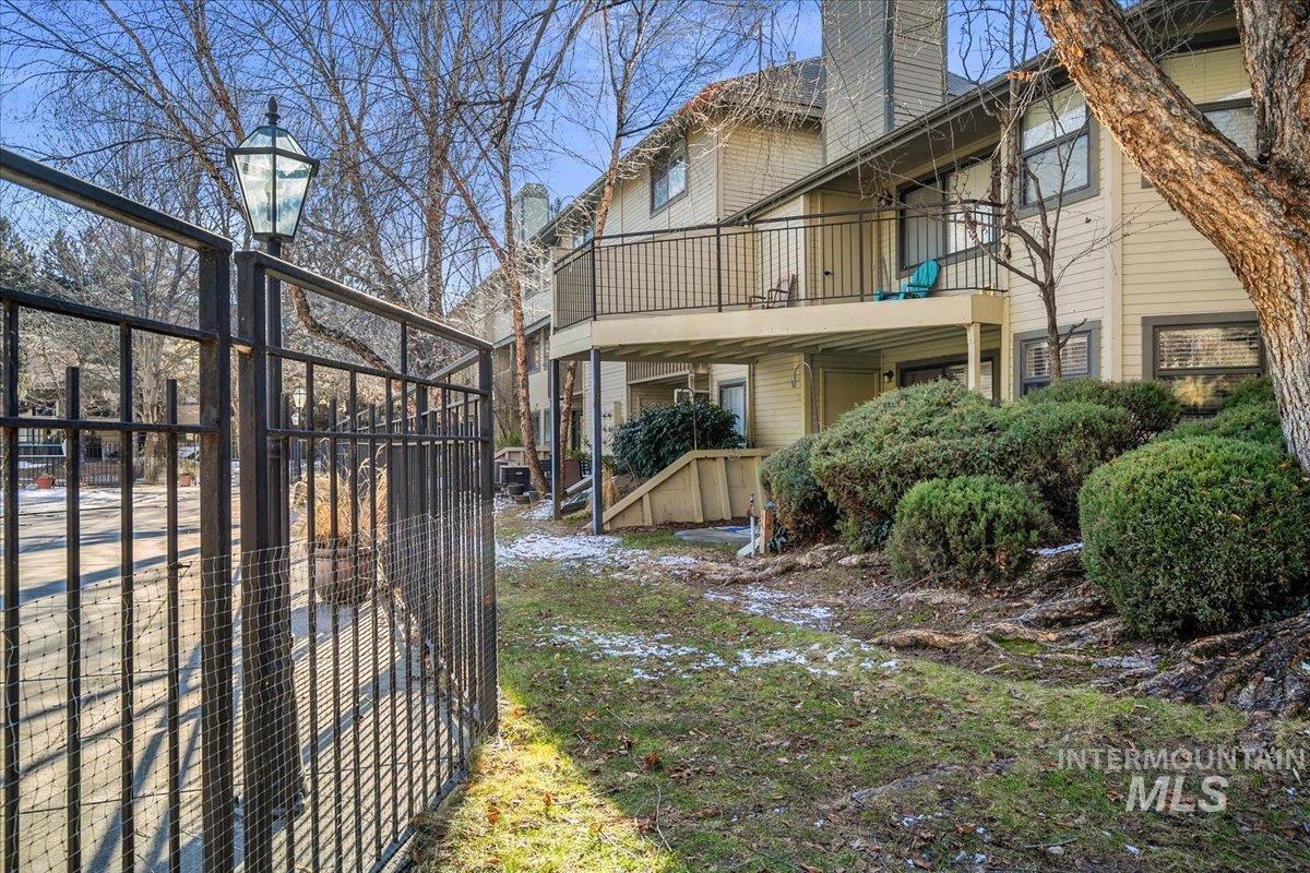 View of yard with a gate