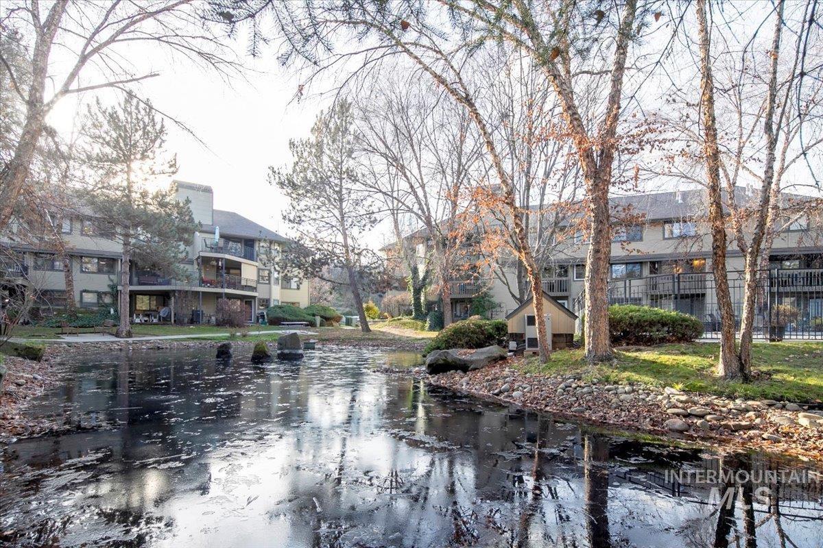 View of property's community featuring a residential view and a balcony