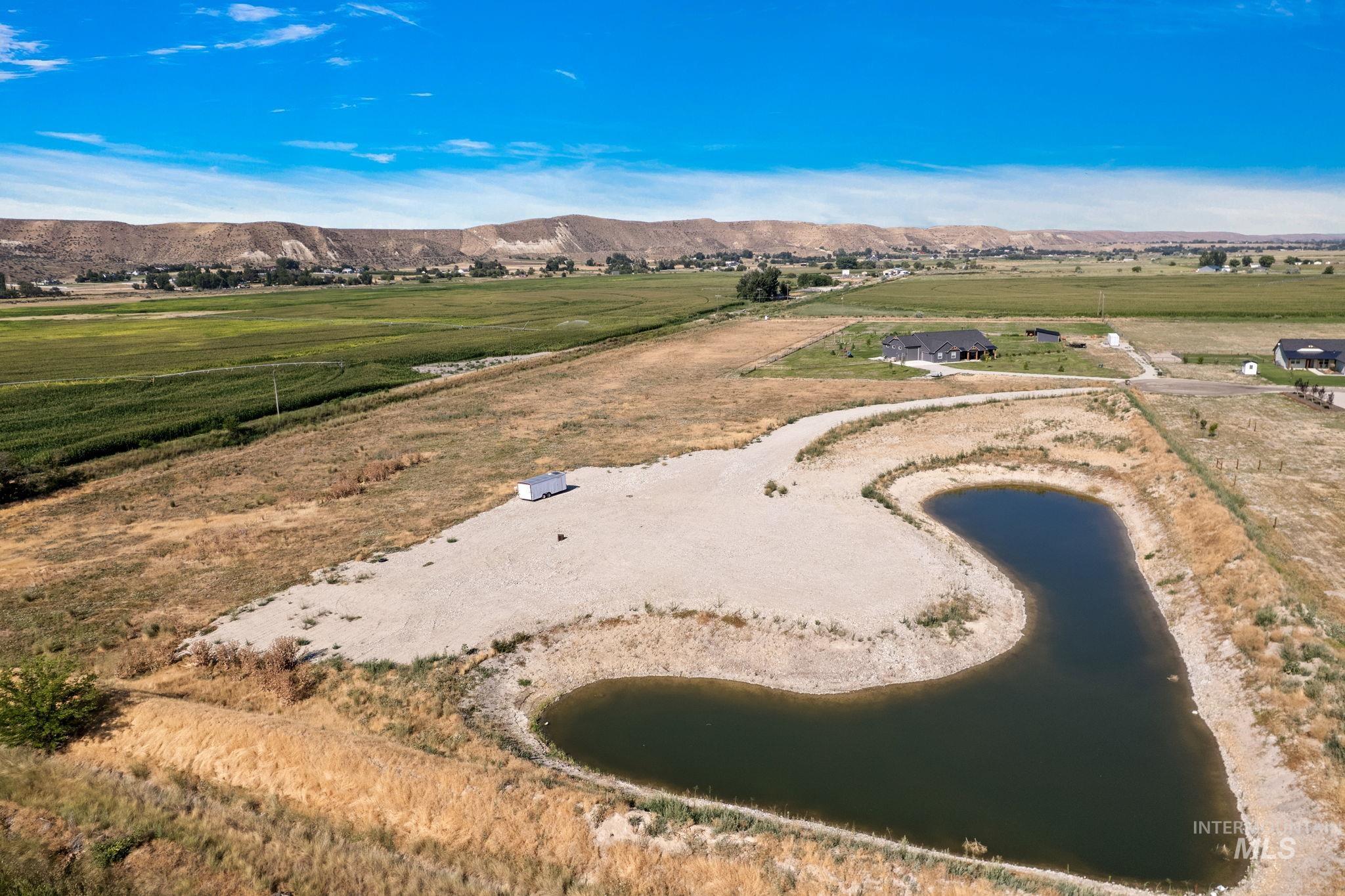 View of rural area featuring a water and mountain view