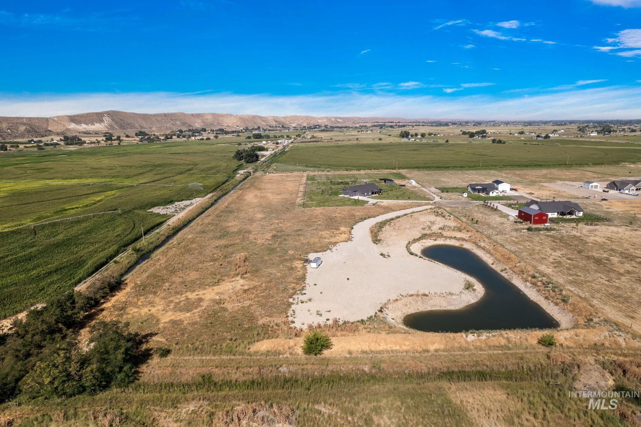 View of rural area featuring a water and mountain view