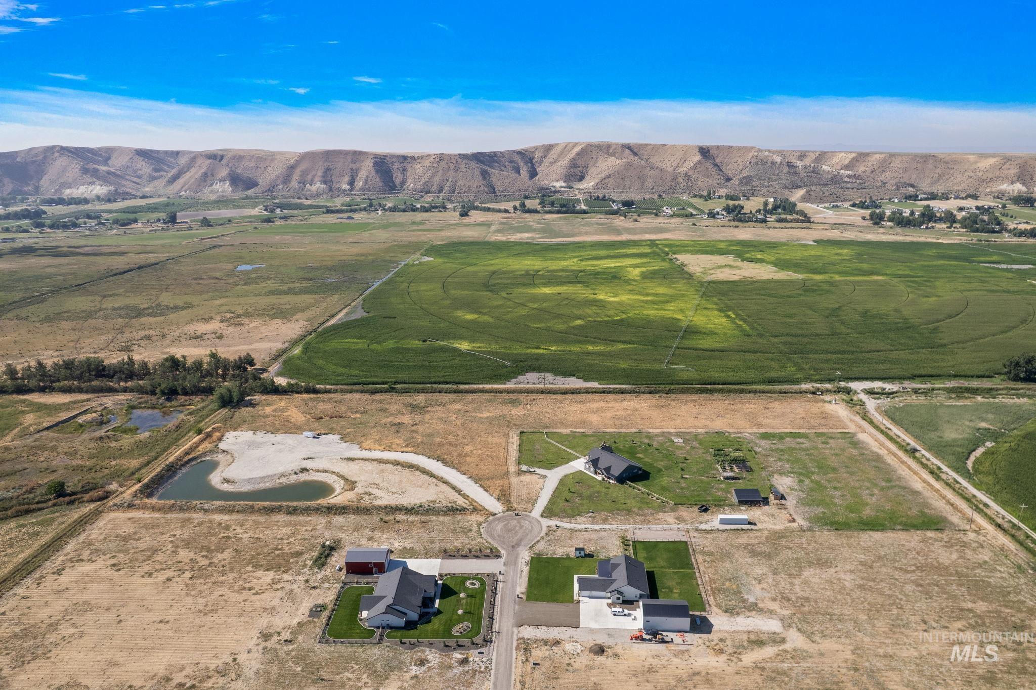 Overview of rural landscape with a mountain backdrop
