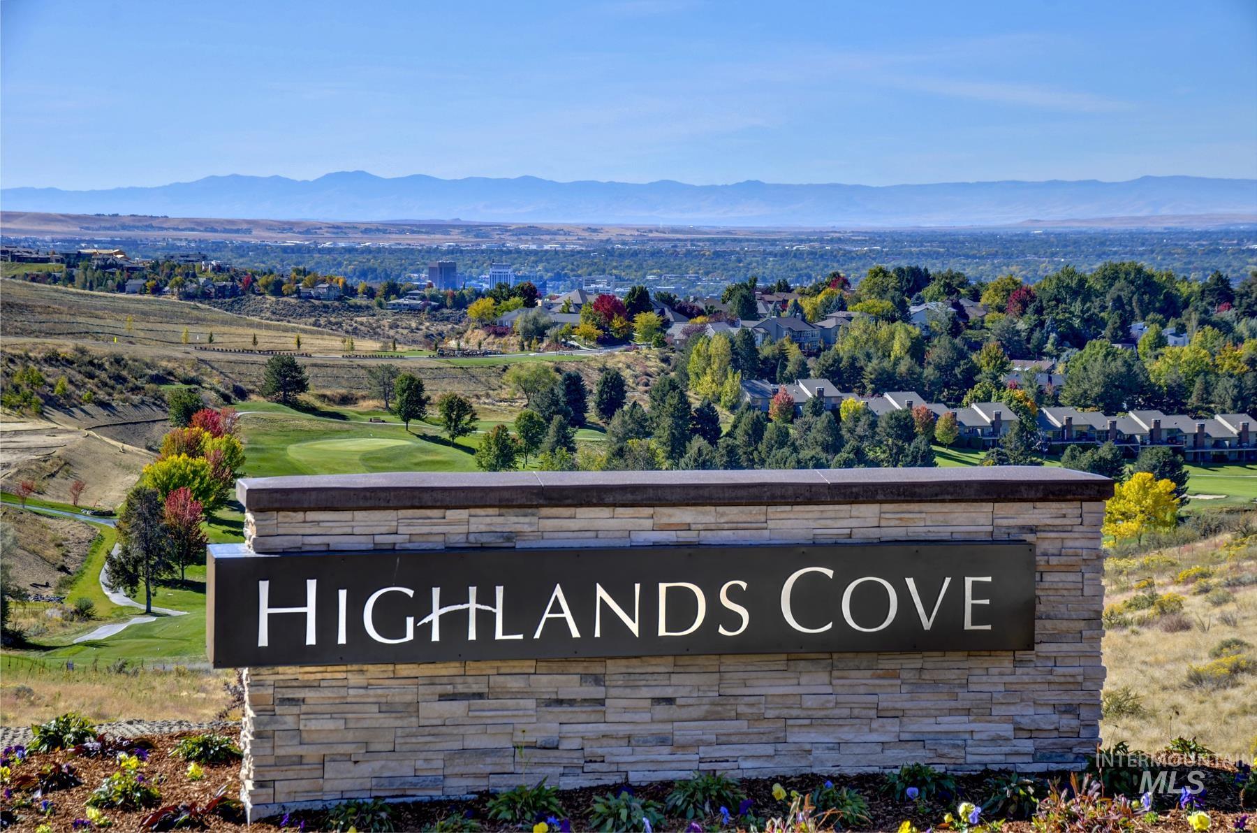 Community sign featuring a mountain view and a residential view