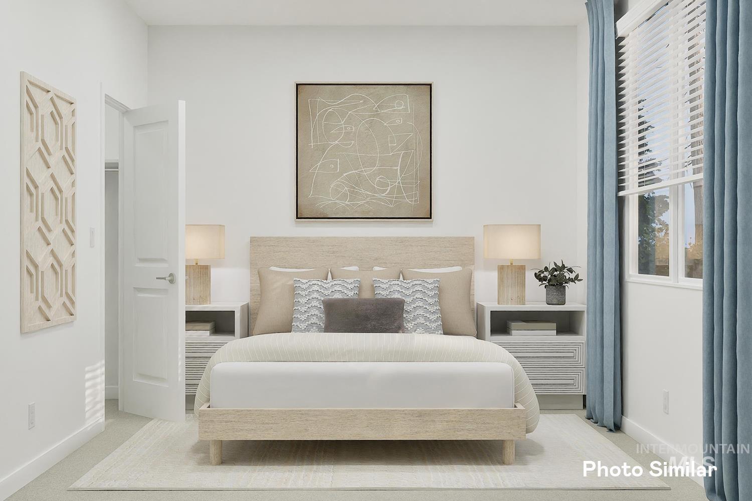 Bedroom featuring baseboards and carpet flooring