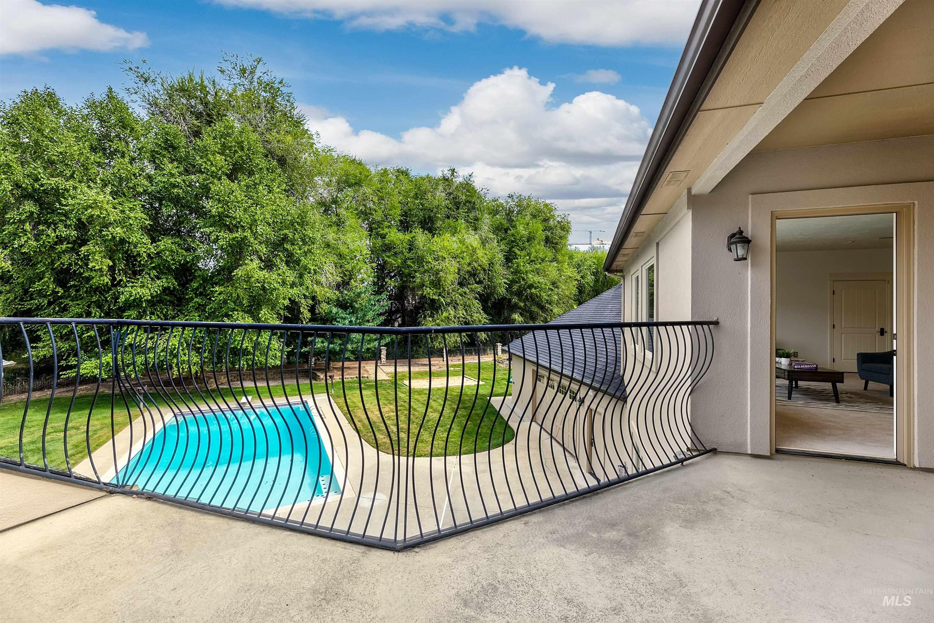 Balcony with view of scattered trees