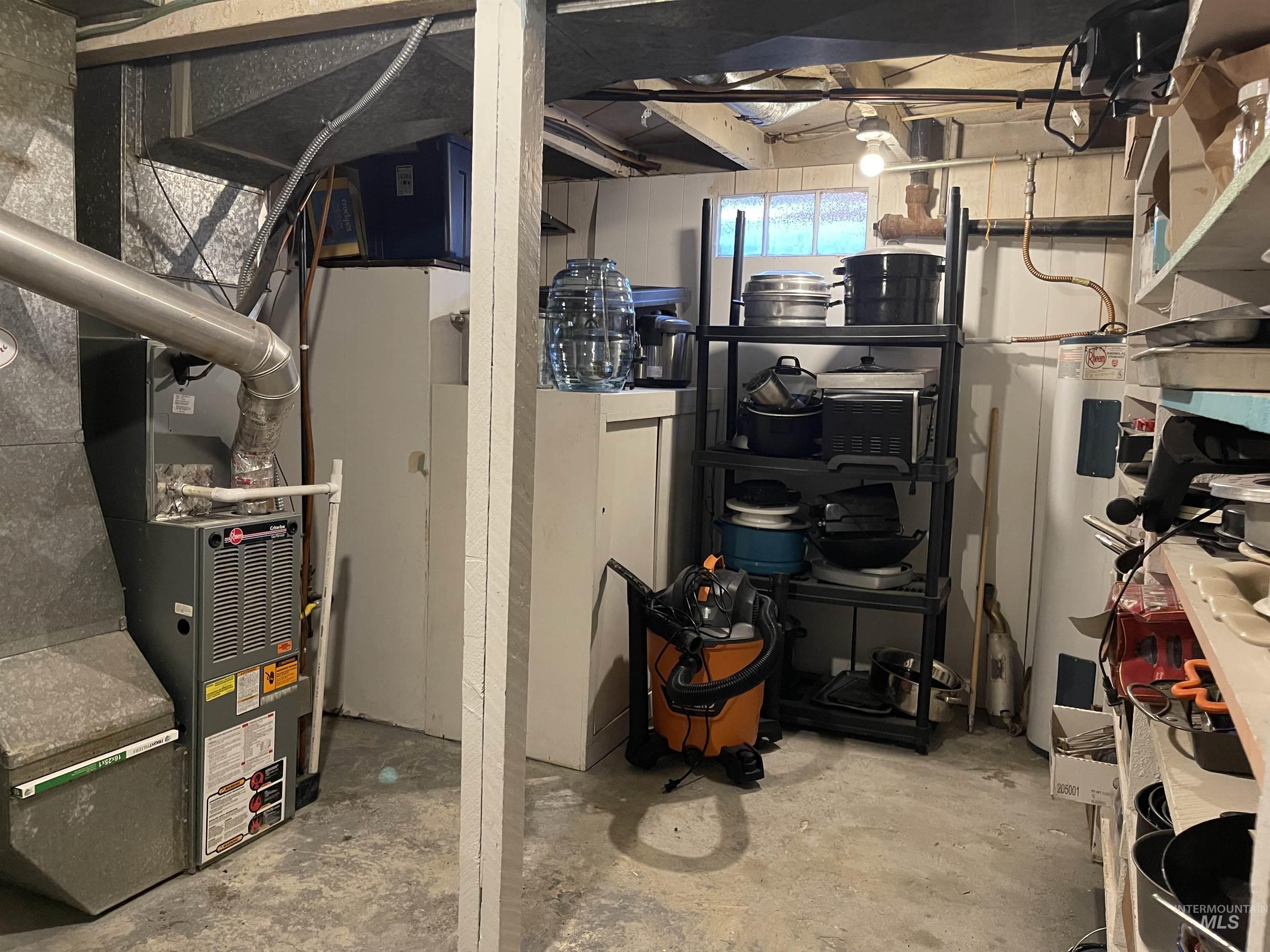 Utilities featuring heating unit and water heater