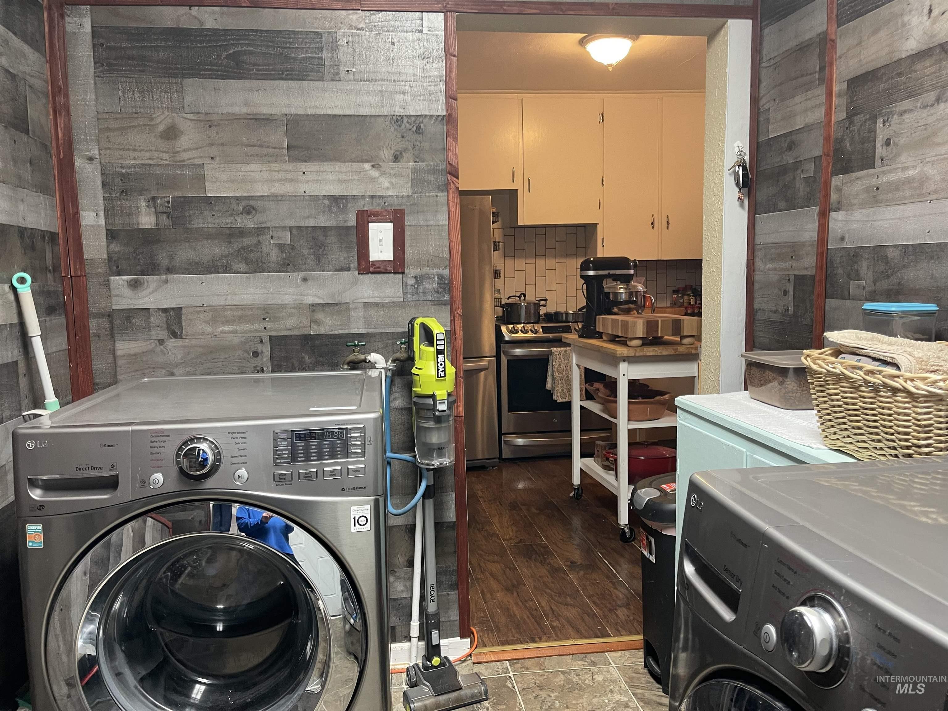 Laundry room featuring washer / clothes dryer