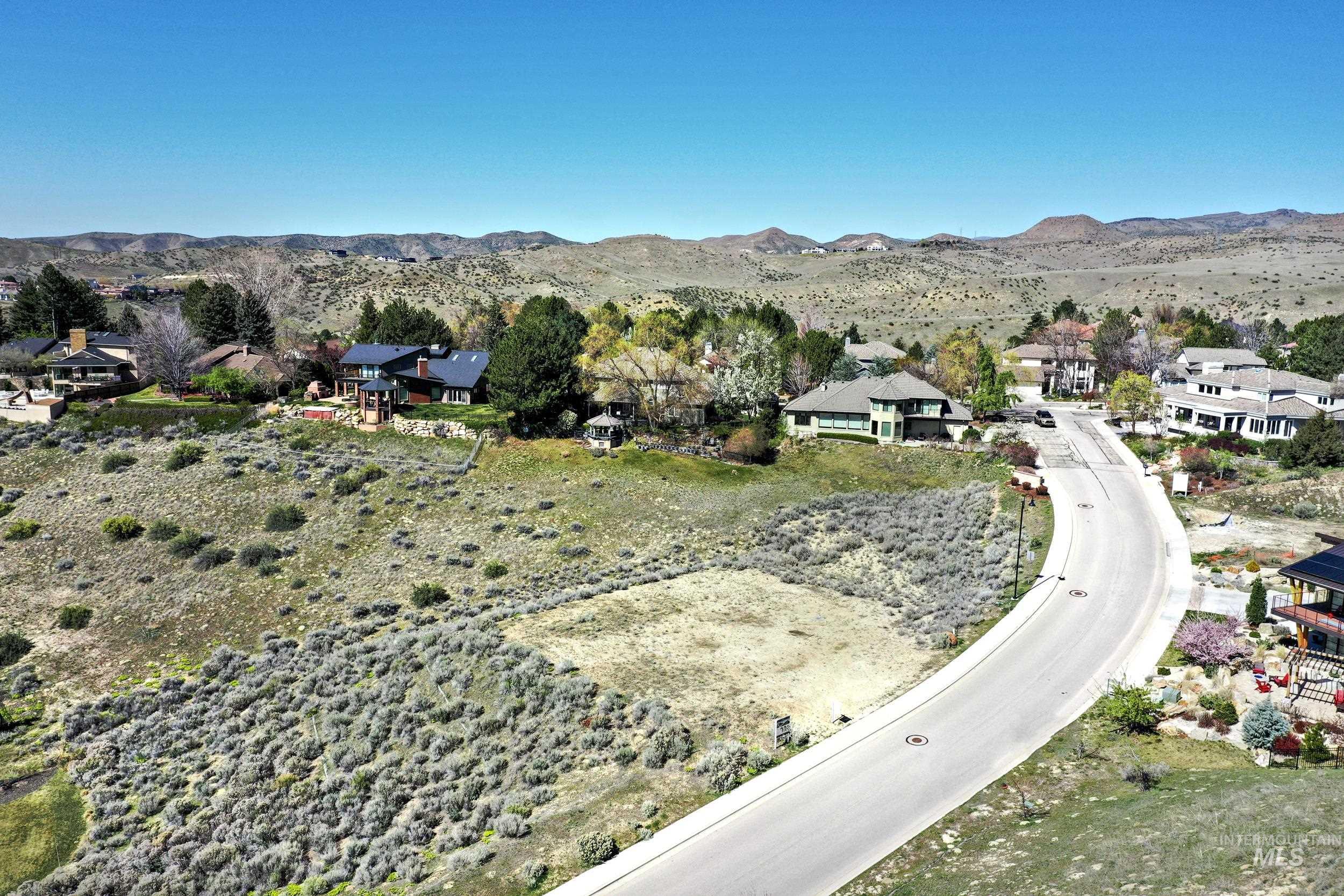 Aerial view of residential area with mountains