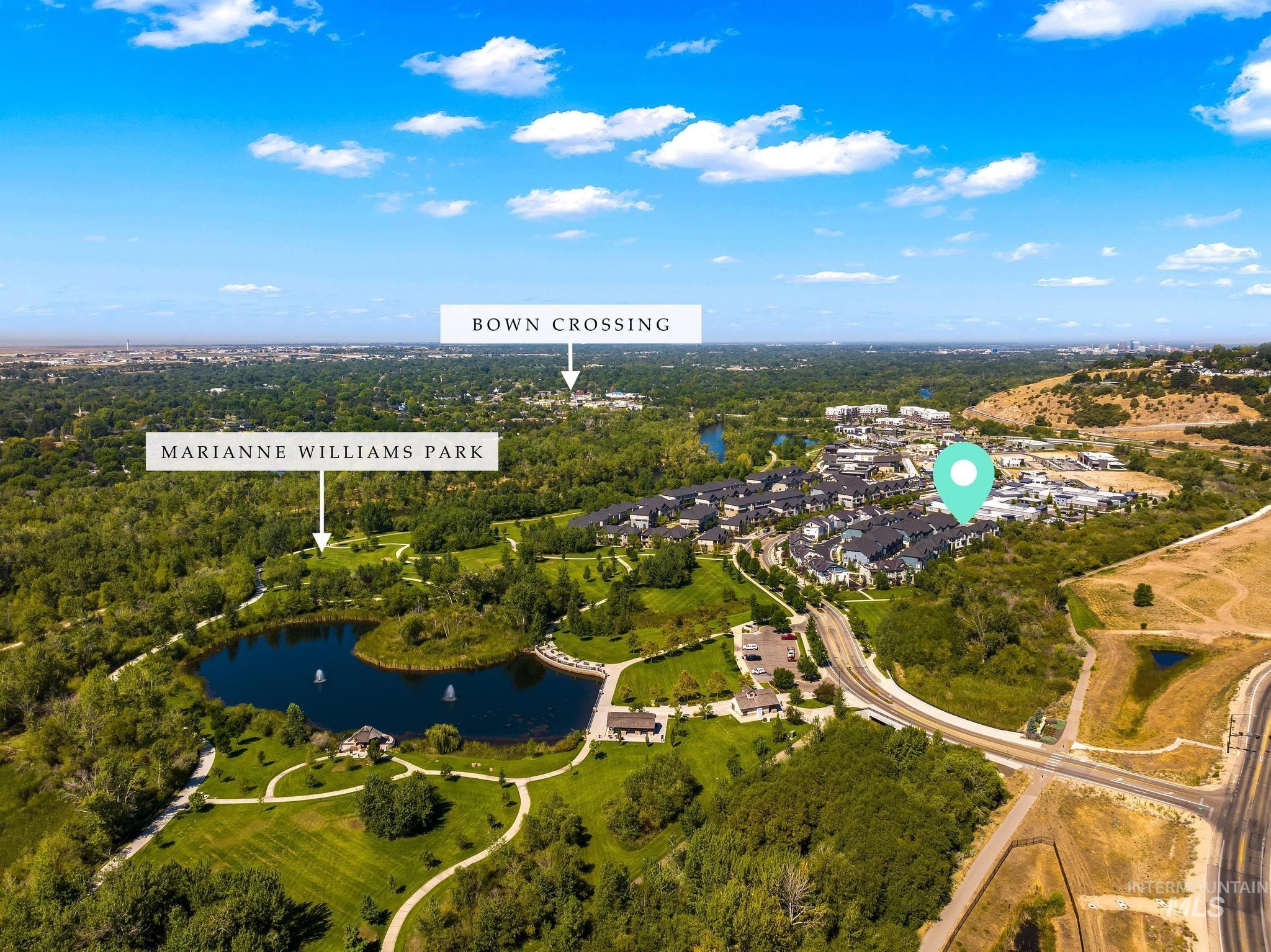 Aerial overview of property's location featuring a large body of water