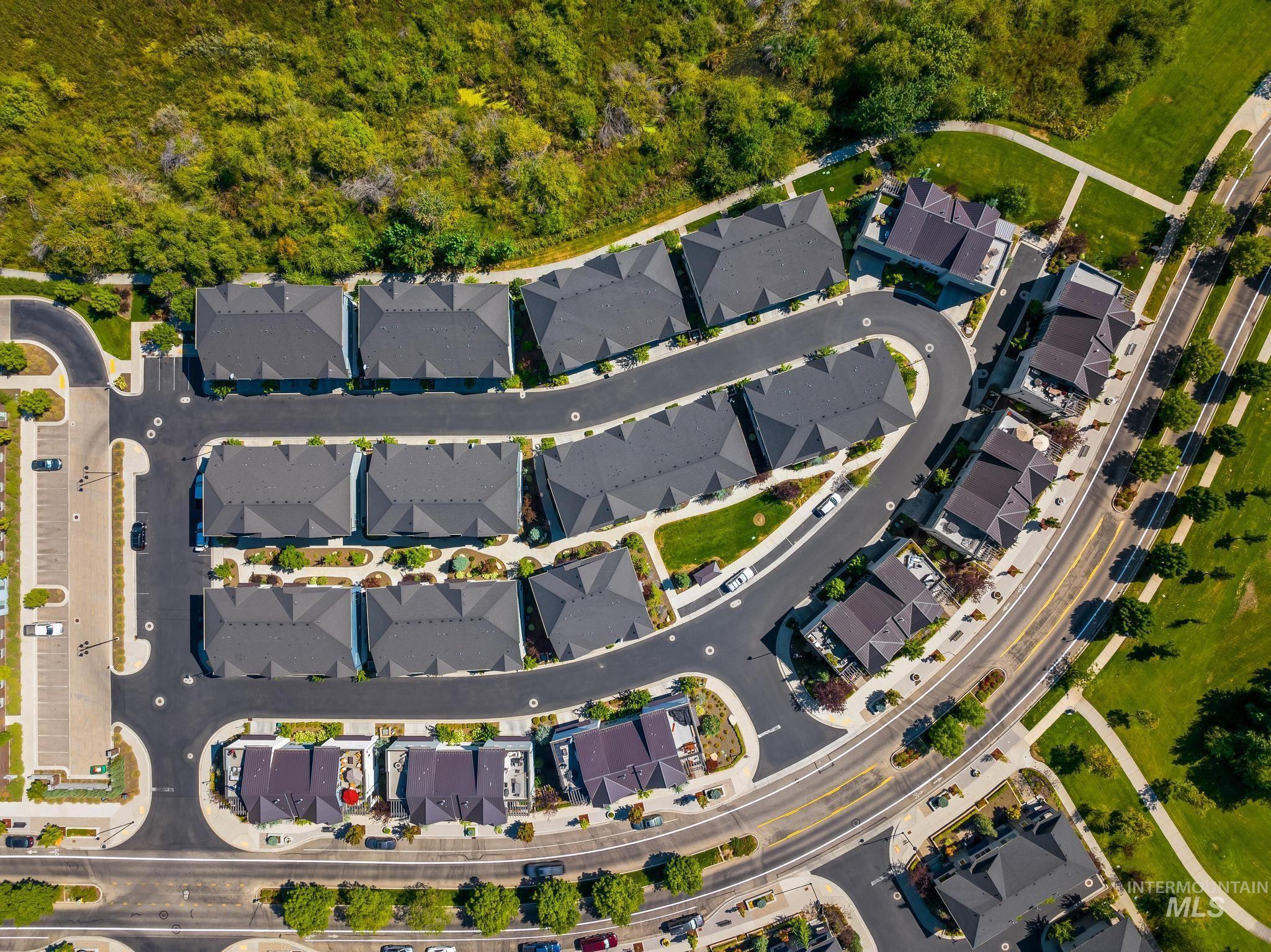Aerial overview of property's location with nearby suburban area