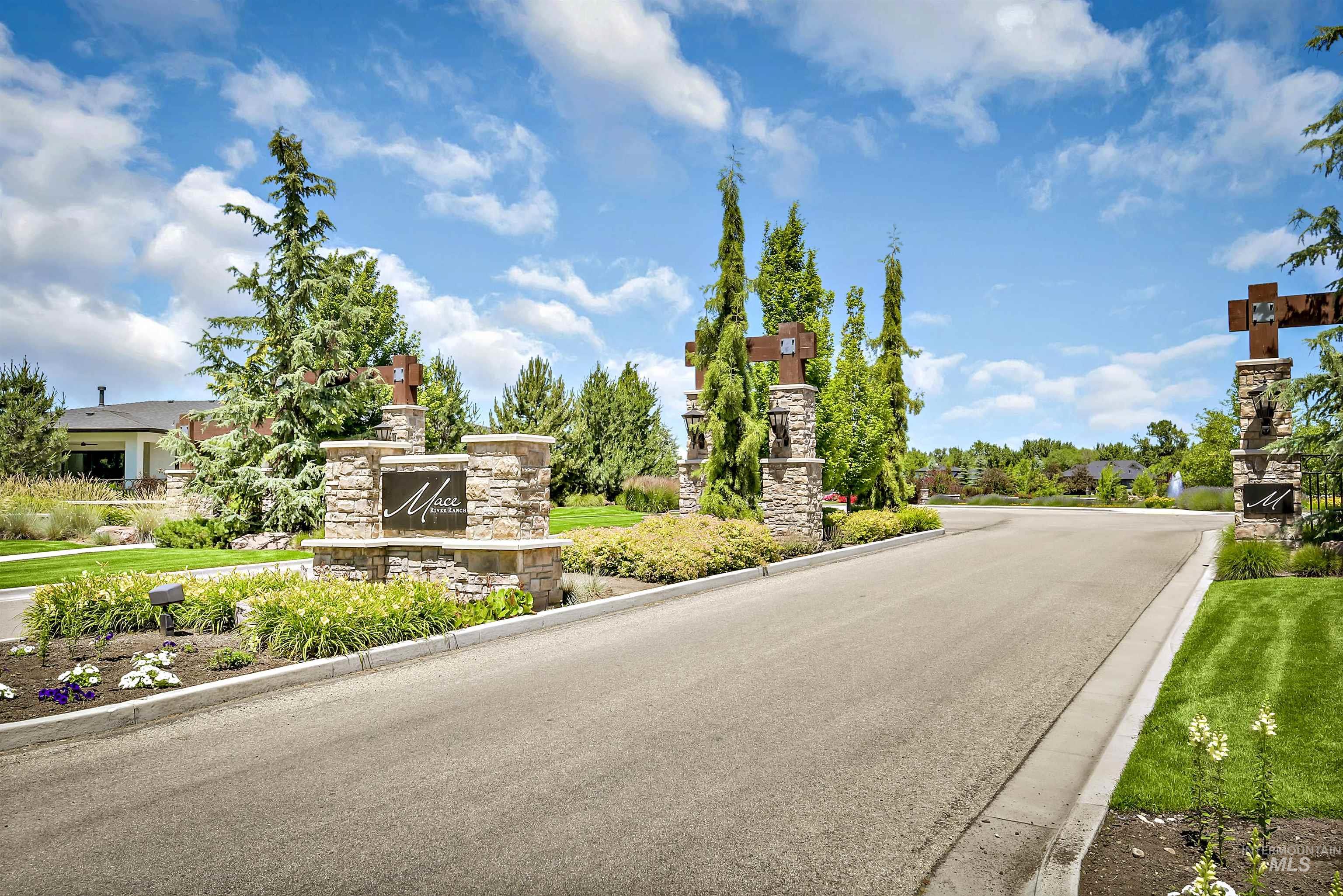 View of asphalt street featuring curbs
