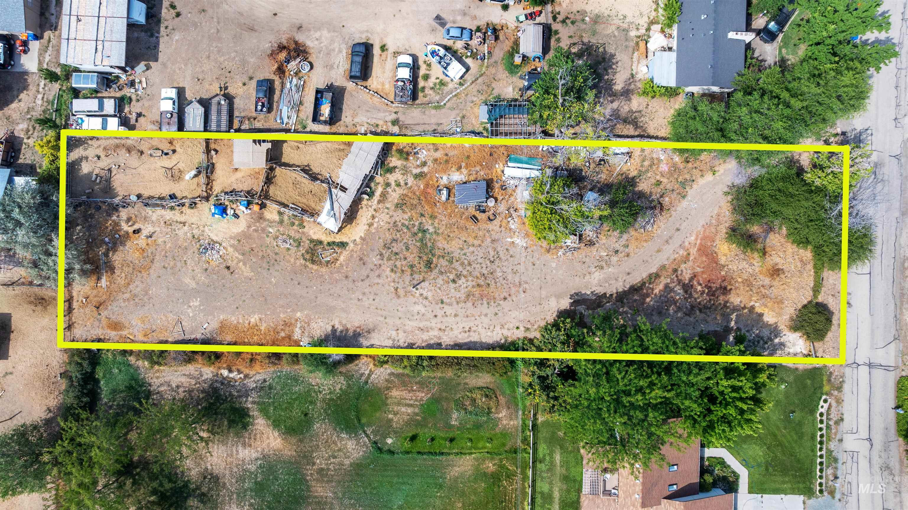 Aerial overview of property's location featuring property boundaries highlighted