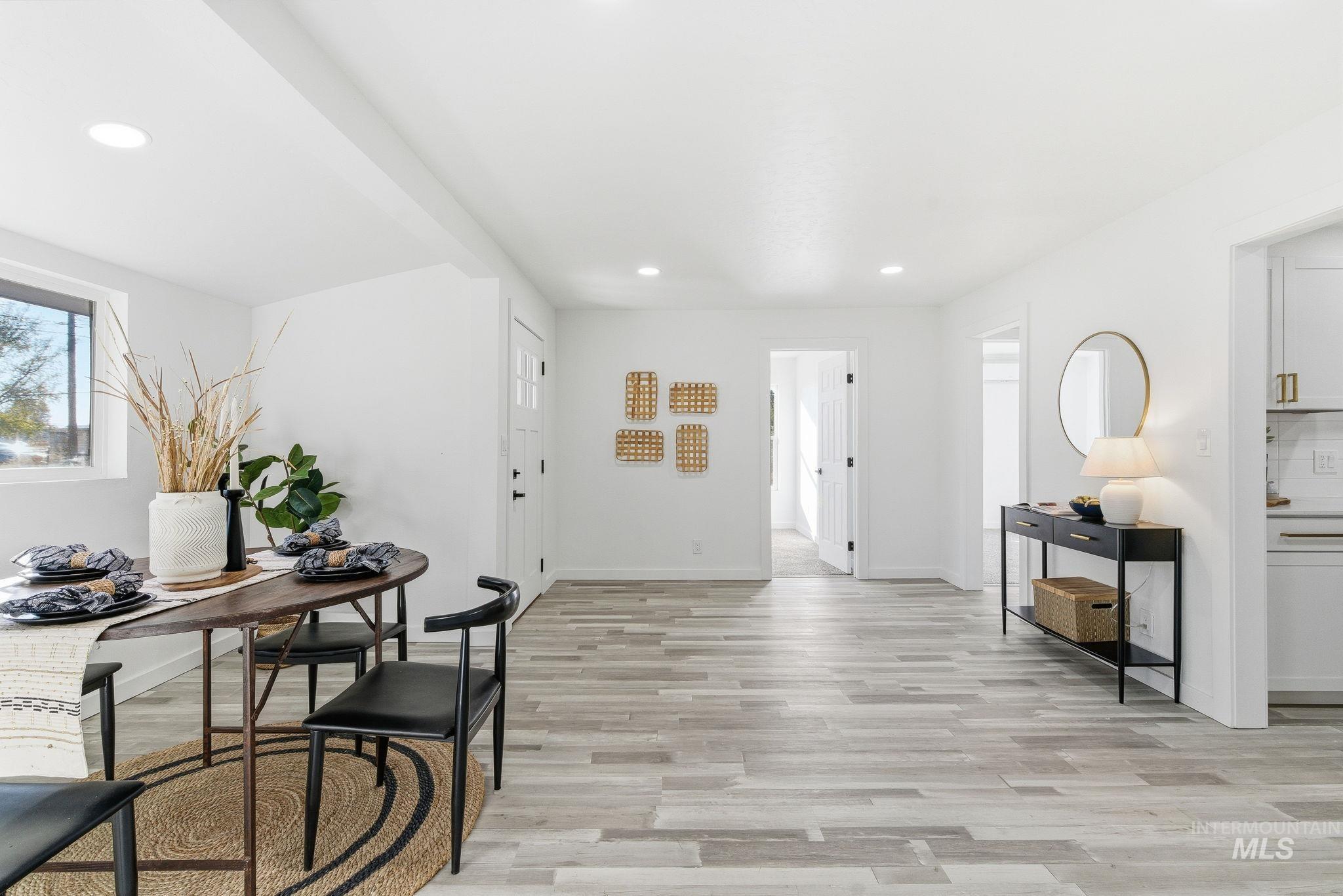 Dining room featuring recessed lighting and light wood finished floors